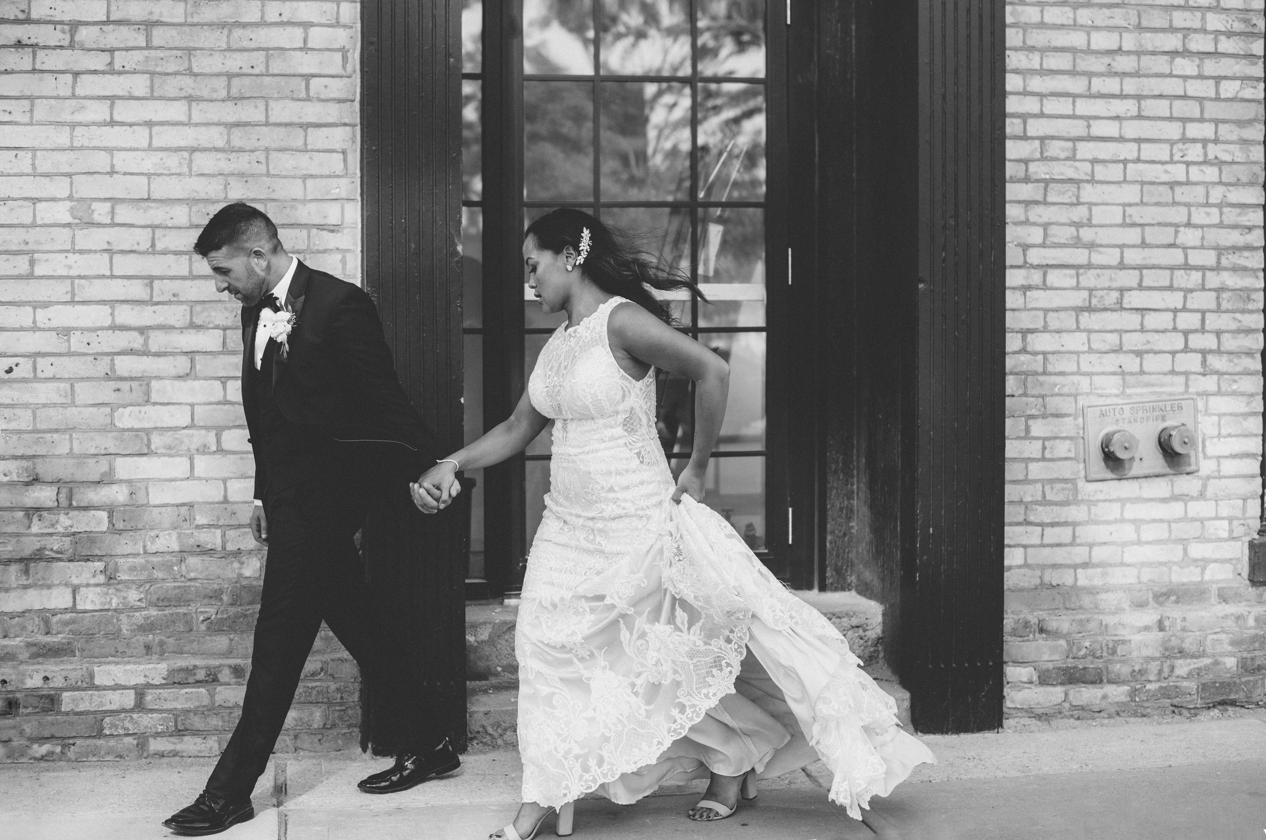 bride and groom running wedding photography.jpg