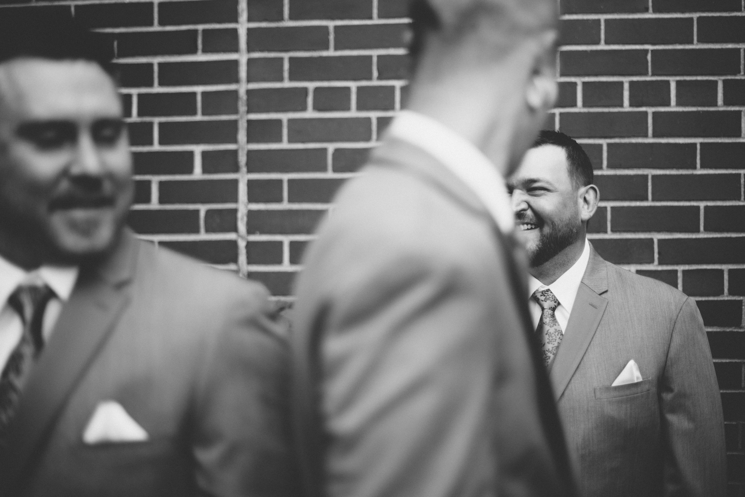 happy groomsmen wedding photography.jpg