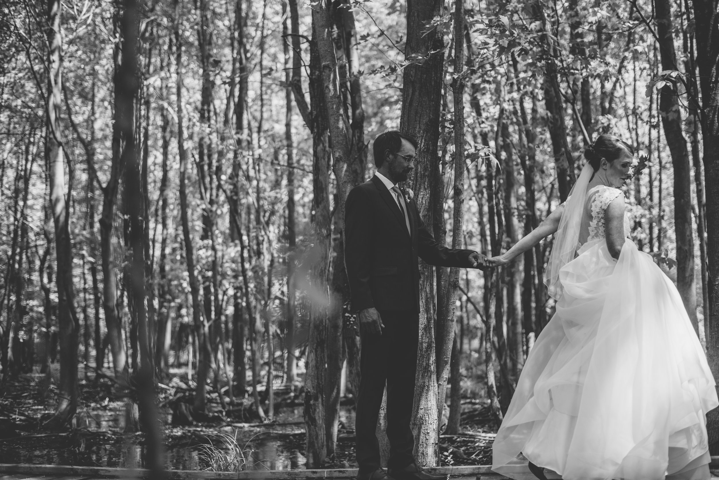 bride and groom in the woods wedding photography.jpg