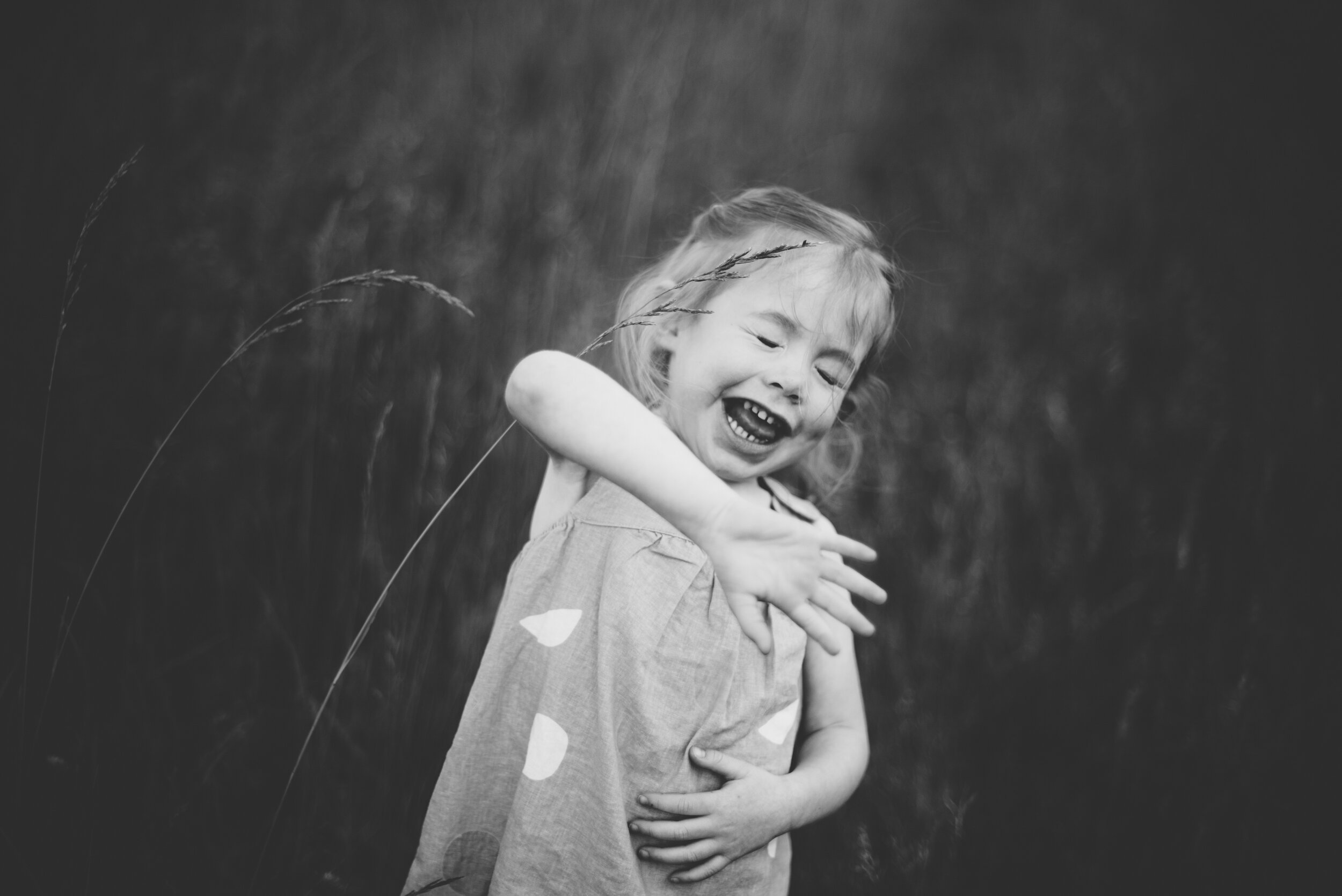 laughing family photoshoot.jpg