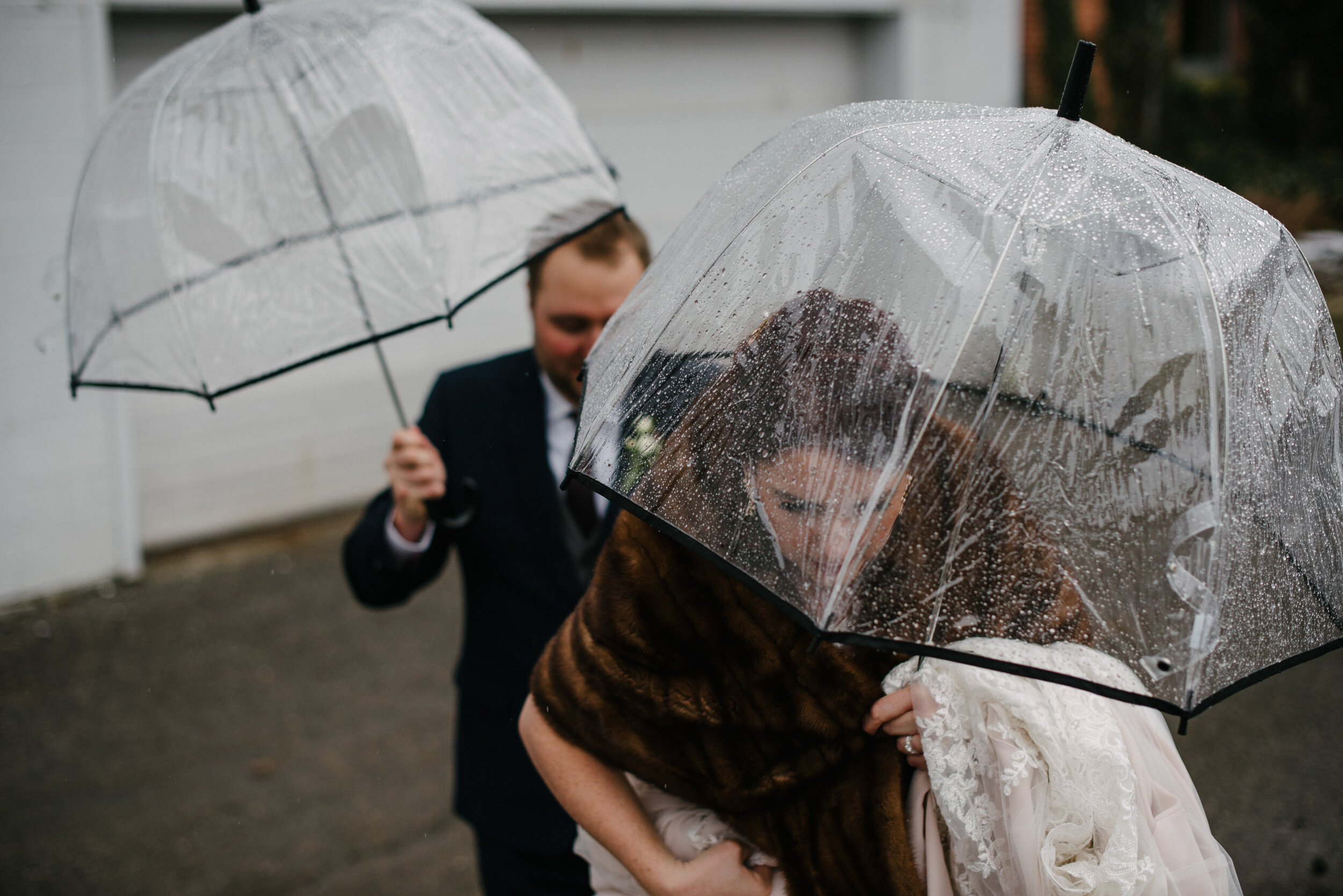 rain bride and groom wedding yai photography.jpg
