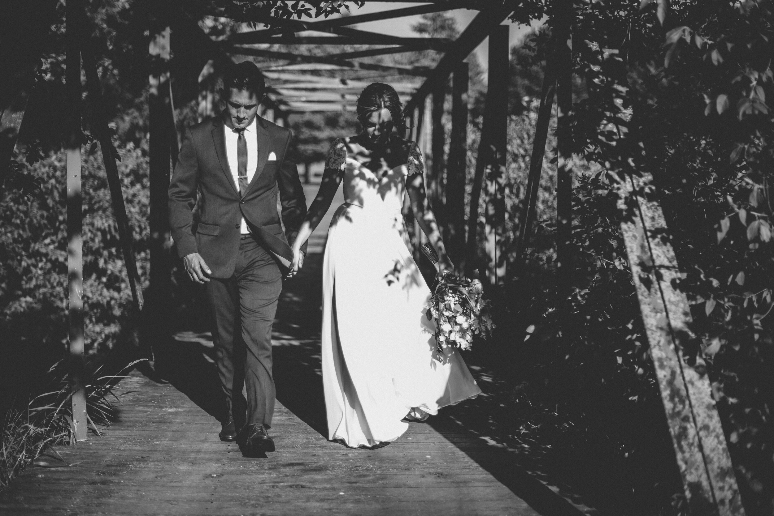 bride and groom on bridge yai photography.jpg