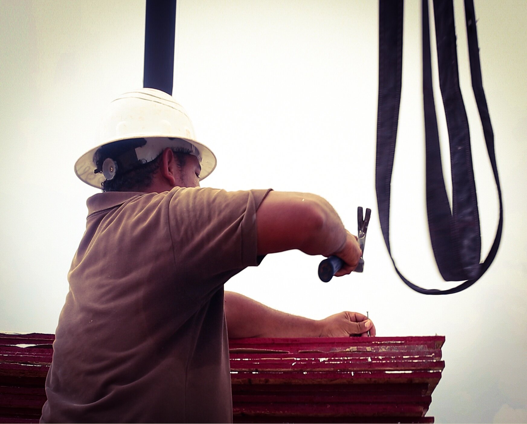 Takes the hard work out of lifting material onto the roof.