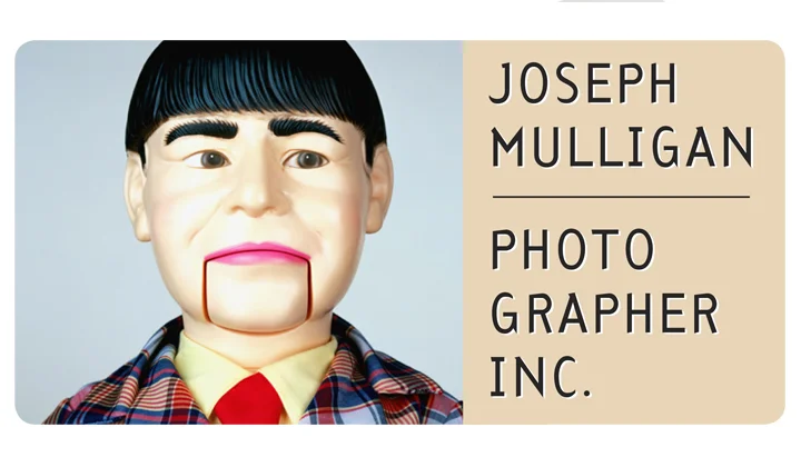 Ventriloquist dummy with text "Joseph Mulligan Photographer Inc."