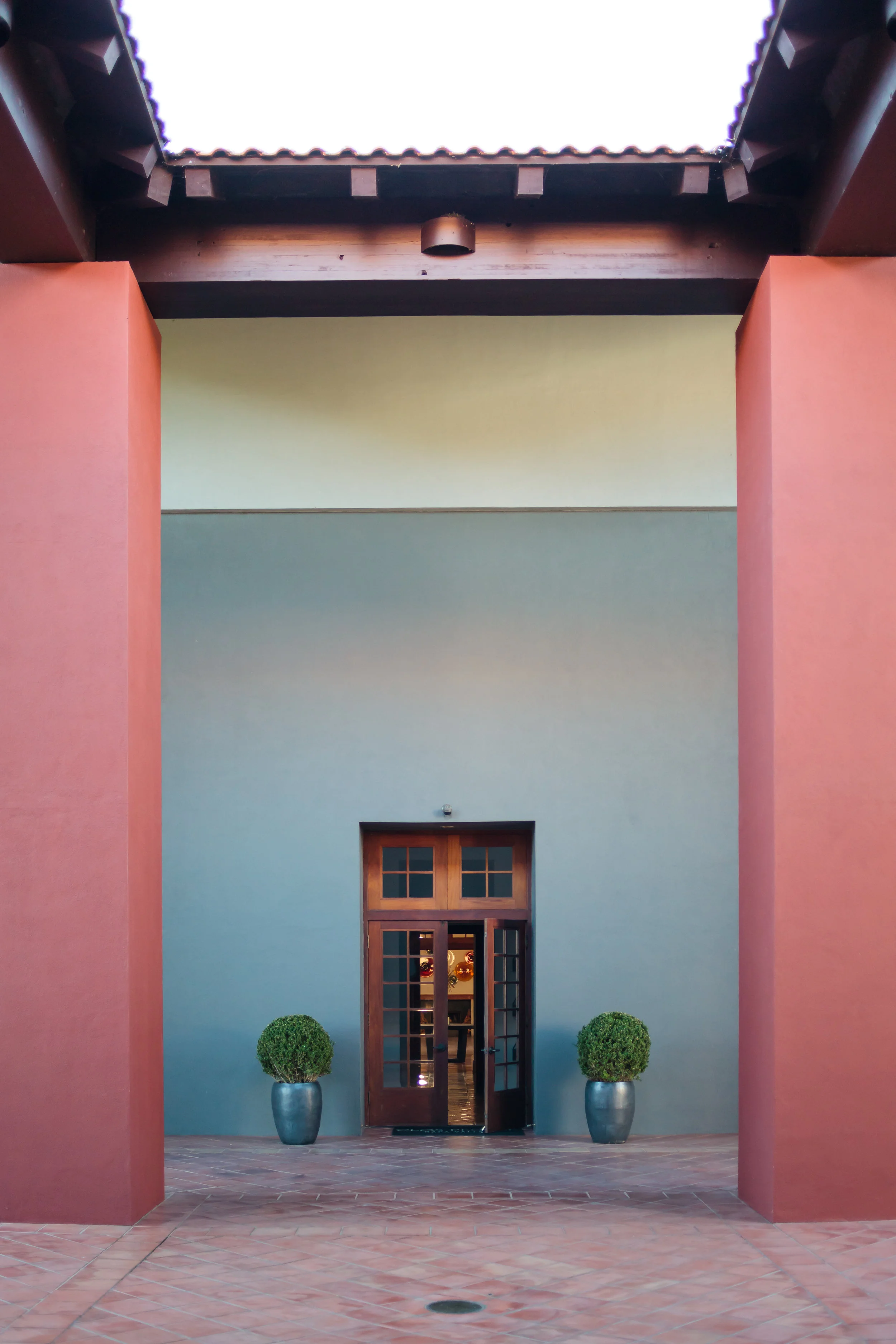 clos_pegasse_entry_bushes_pillars-1.jpg