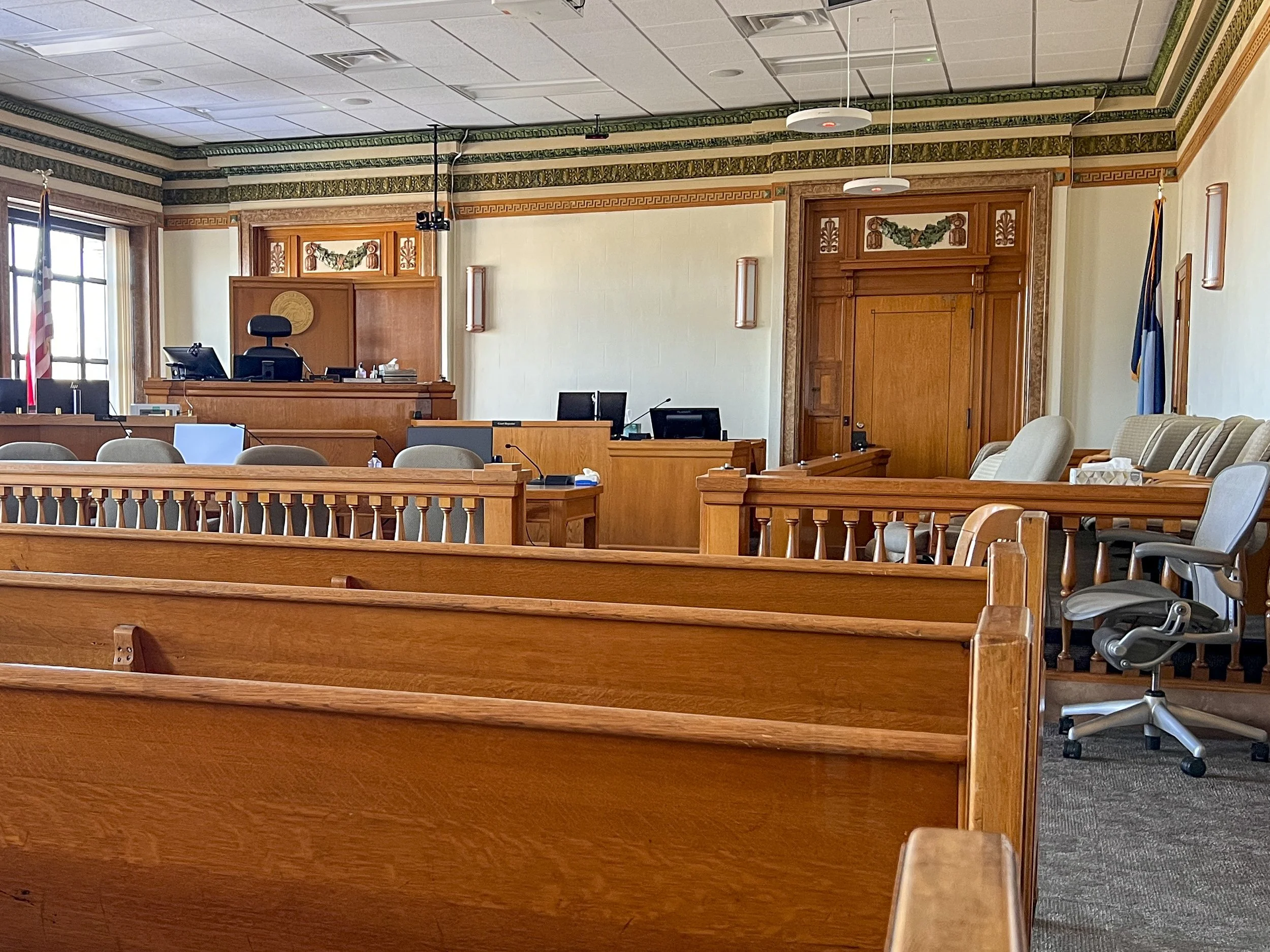 The detailing is preserved in a courthroom updated for 21st c. business