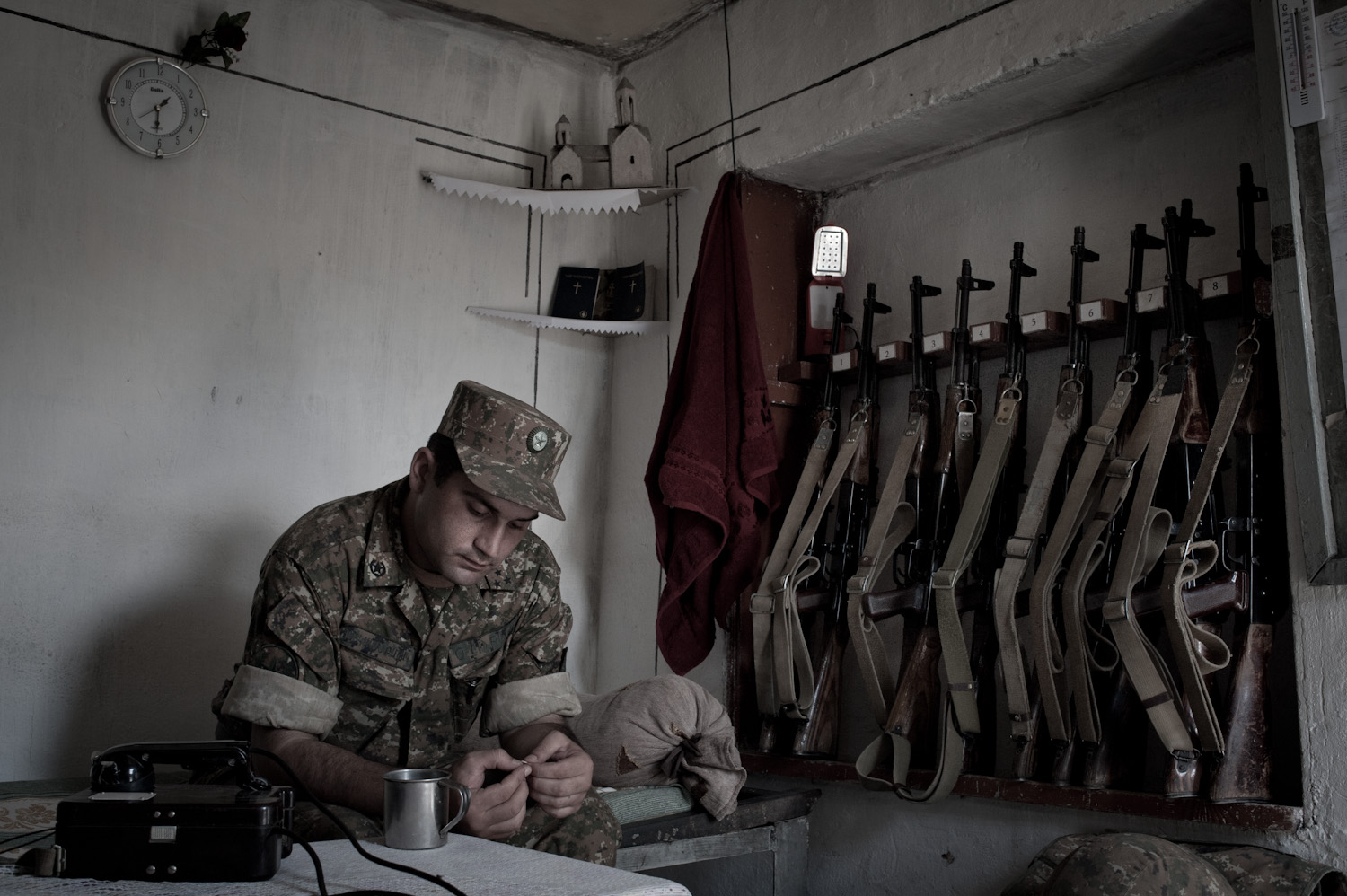  Commander Artur Mgrchyan rests in his dugout. He has been serving at the Mataghis frontline in Nagorno-Karabakh for the last 5 years.  