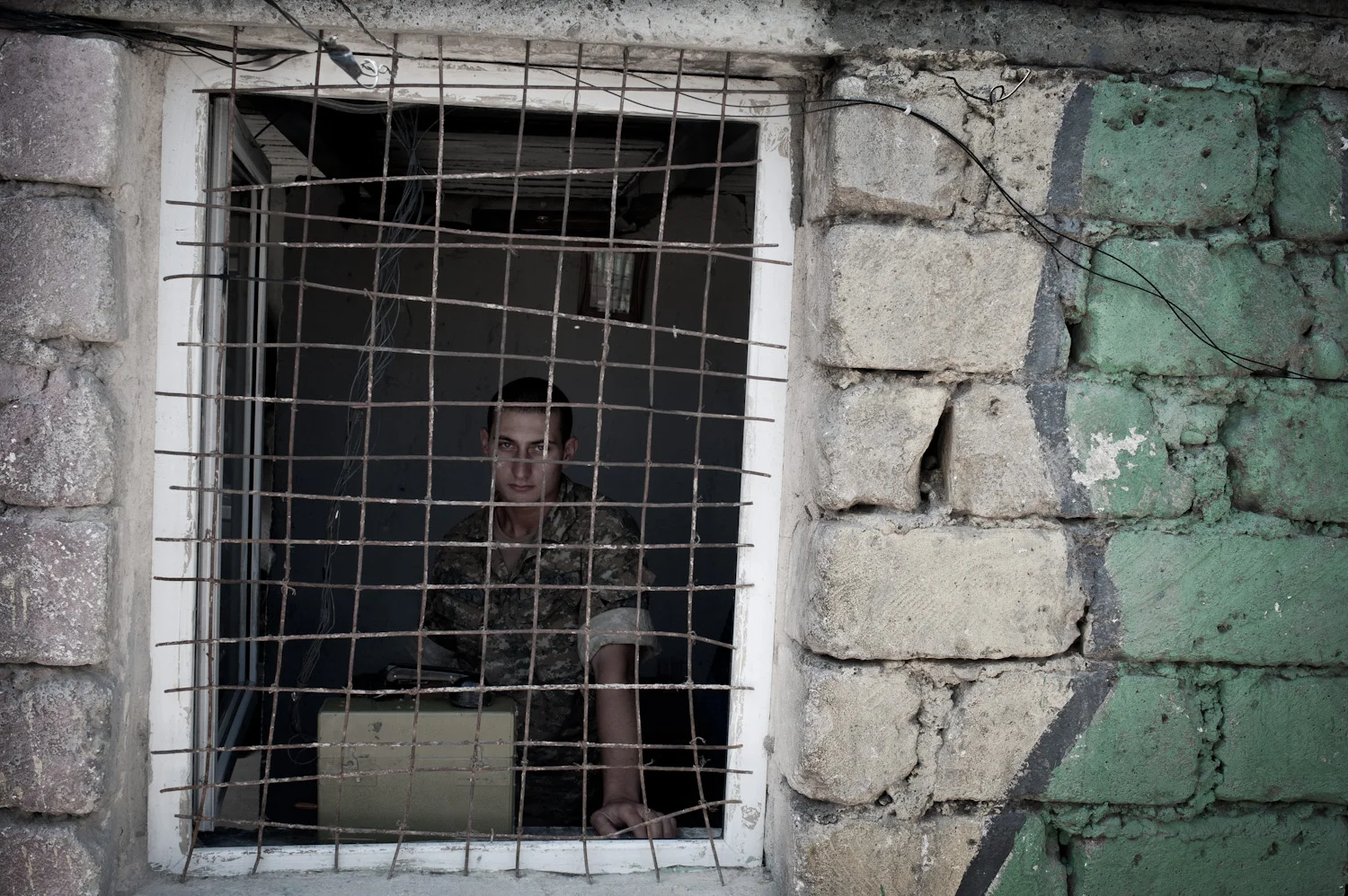 A soldier staffs a communications point at the Mataghis frontline, near Martakert, Nagorno-Karabakh.