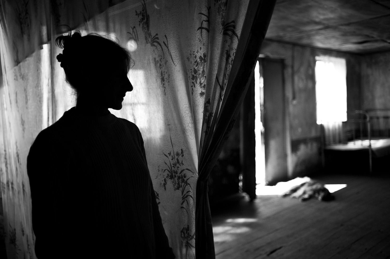  In Tretuk village, this abandoned home of an Azerbaijani family has been inhabited by Grisha, his wife, and their 7 children since they moved to Armenia from Kirovabad. Grisha cannot find a job, the family lives on government subsidies.  