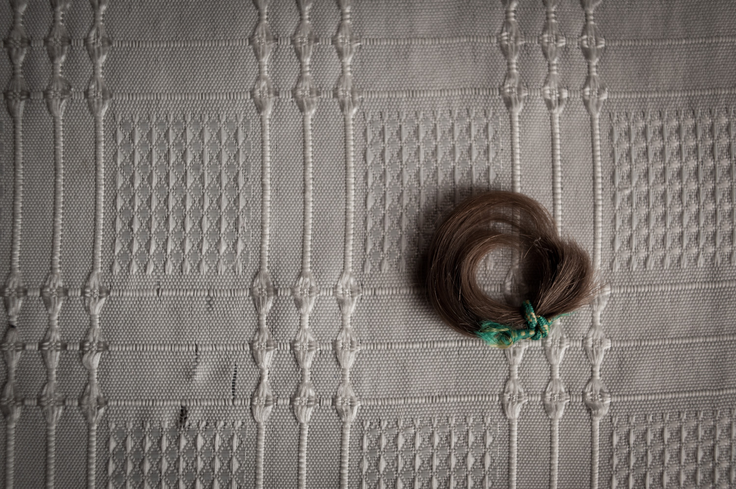  Araik's mother keeps a tuft of her son's hair from his childhood.   