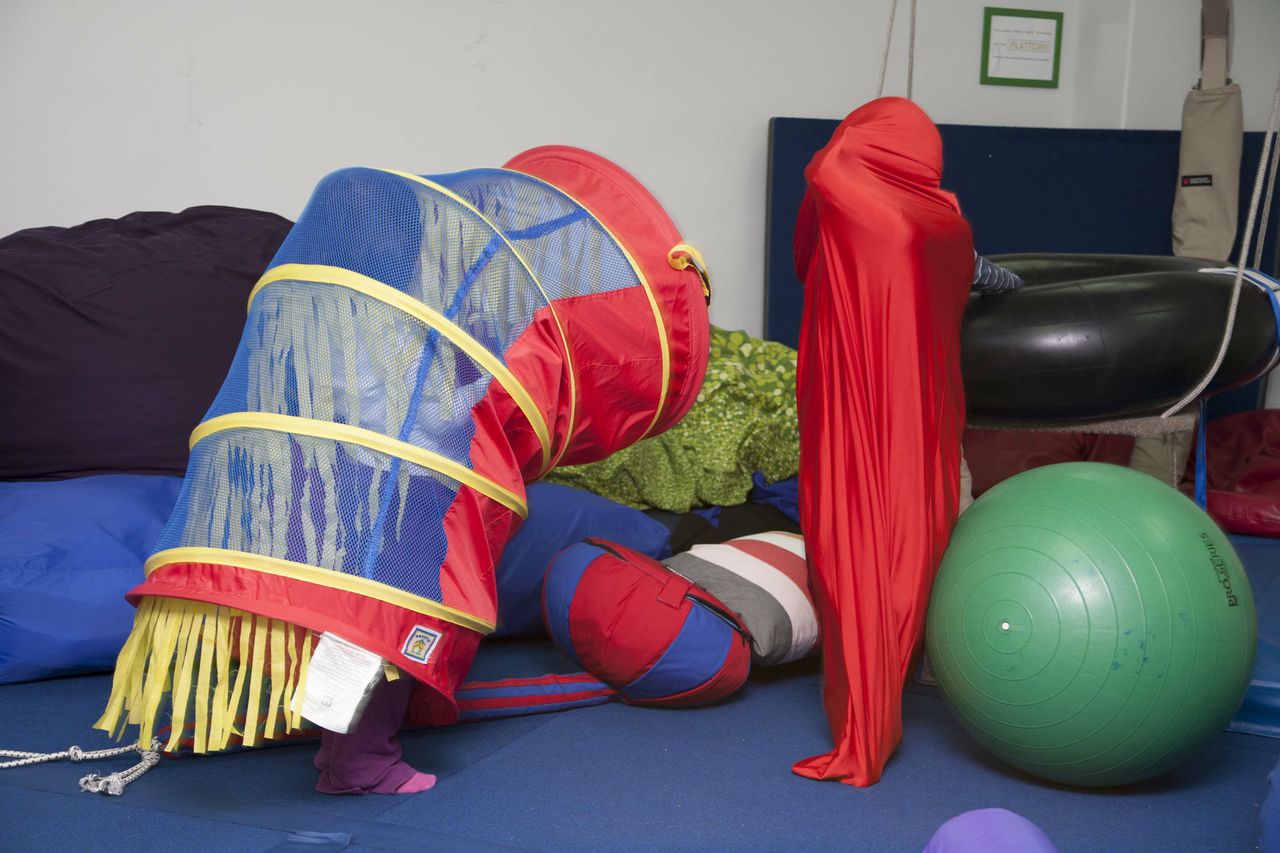 "This is perfect for my son Shane, who has been diagnosed with SPD and ADHD . The "body glove" is a quick way to ge t him back into his body. I also like that Shane's playmate Fiona is using the crawl through tunnel as an invisible force field. Sometimes unstructured imagin ative play is just what Shane needs to assist him in developing stronger sociali zation skills"