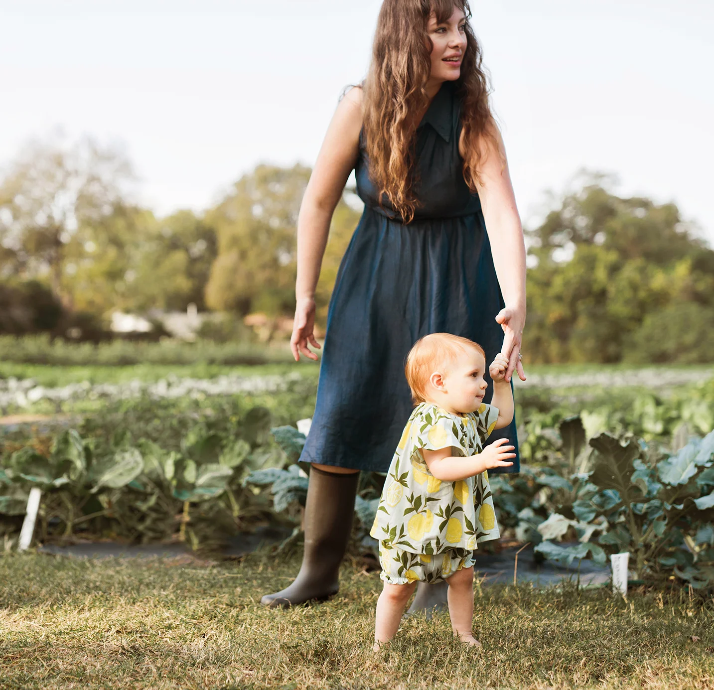 mom and baby in garden milkbarn.jpg