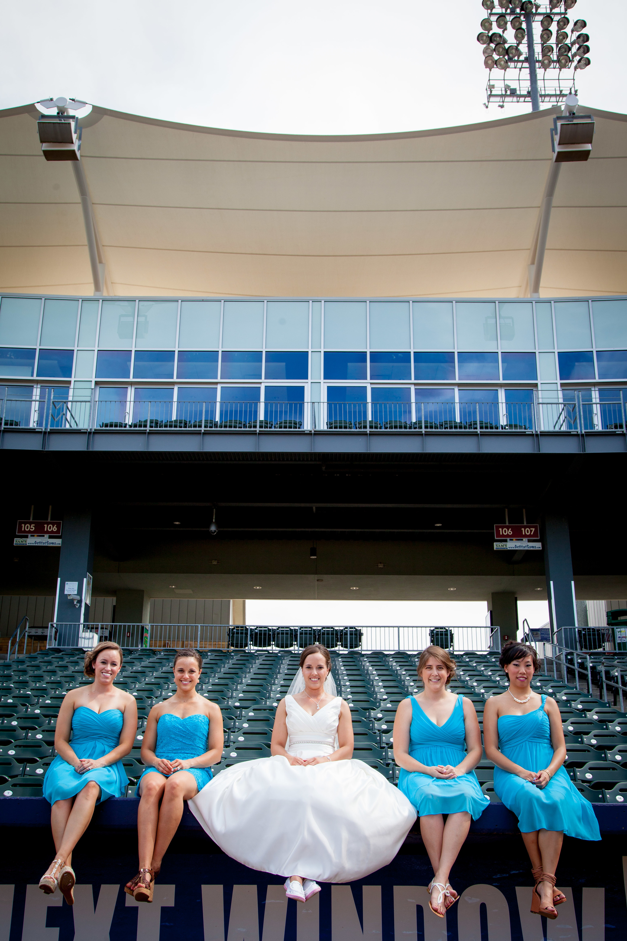 "You probably don't want to sit on the dugout in your white dress, right?" "Sure! Why not?"