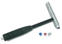 Figure 17. Impact hammer instrumented with a force sensor to measure the excitation force and different hardness tips