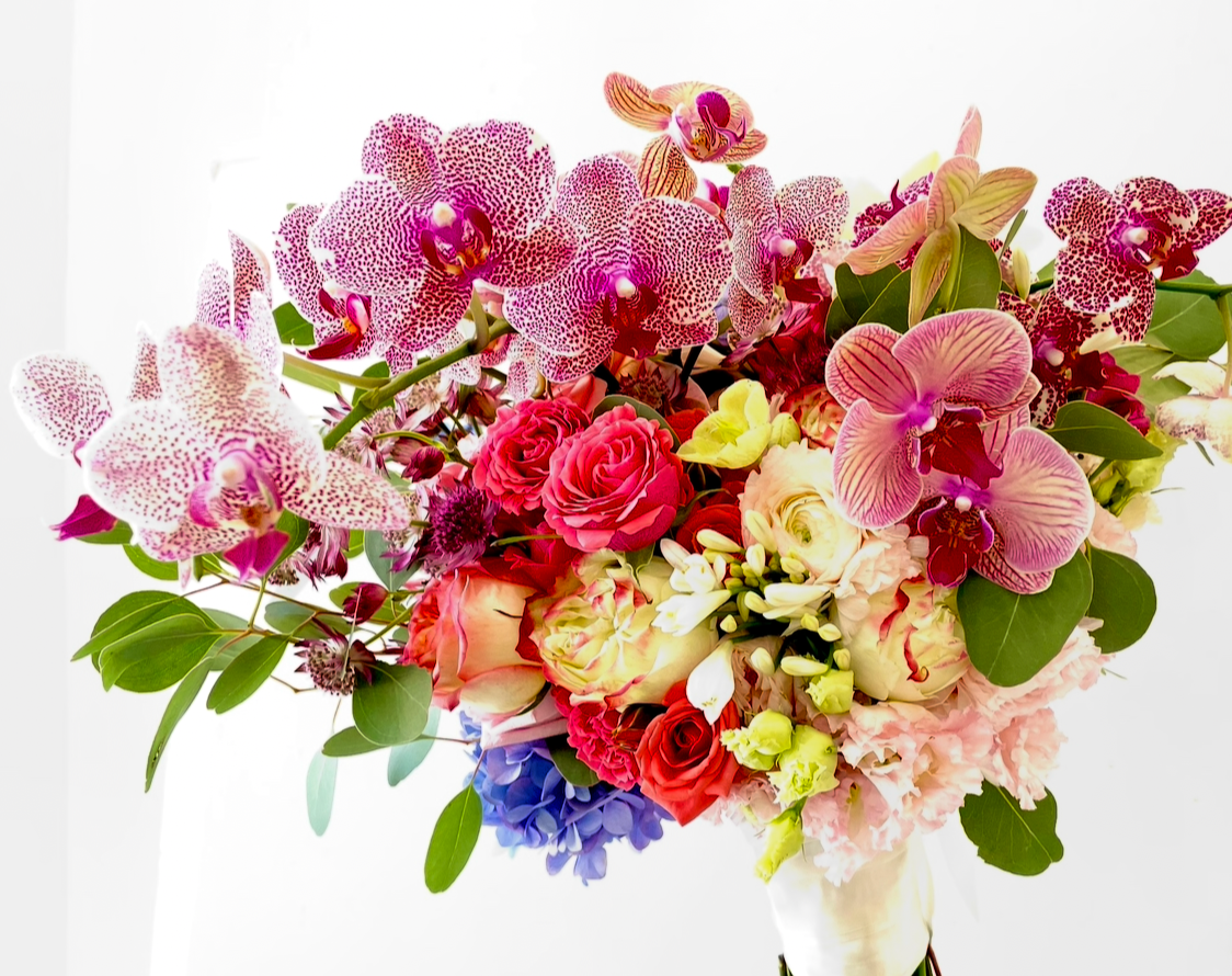   Kyo no Hana - Kyoto   Layered pink, reddish tones arranged in cloud-like fullness.  Textural yet refined, this design embodies modern Japanese, spring elegance.   Bouquet starts from $250~$550, Arrangement starts from $350~$650.  