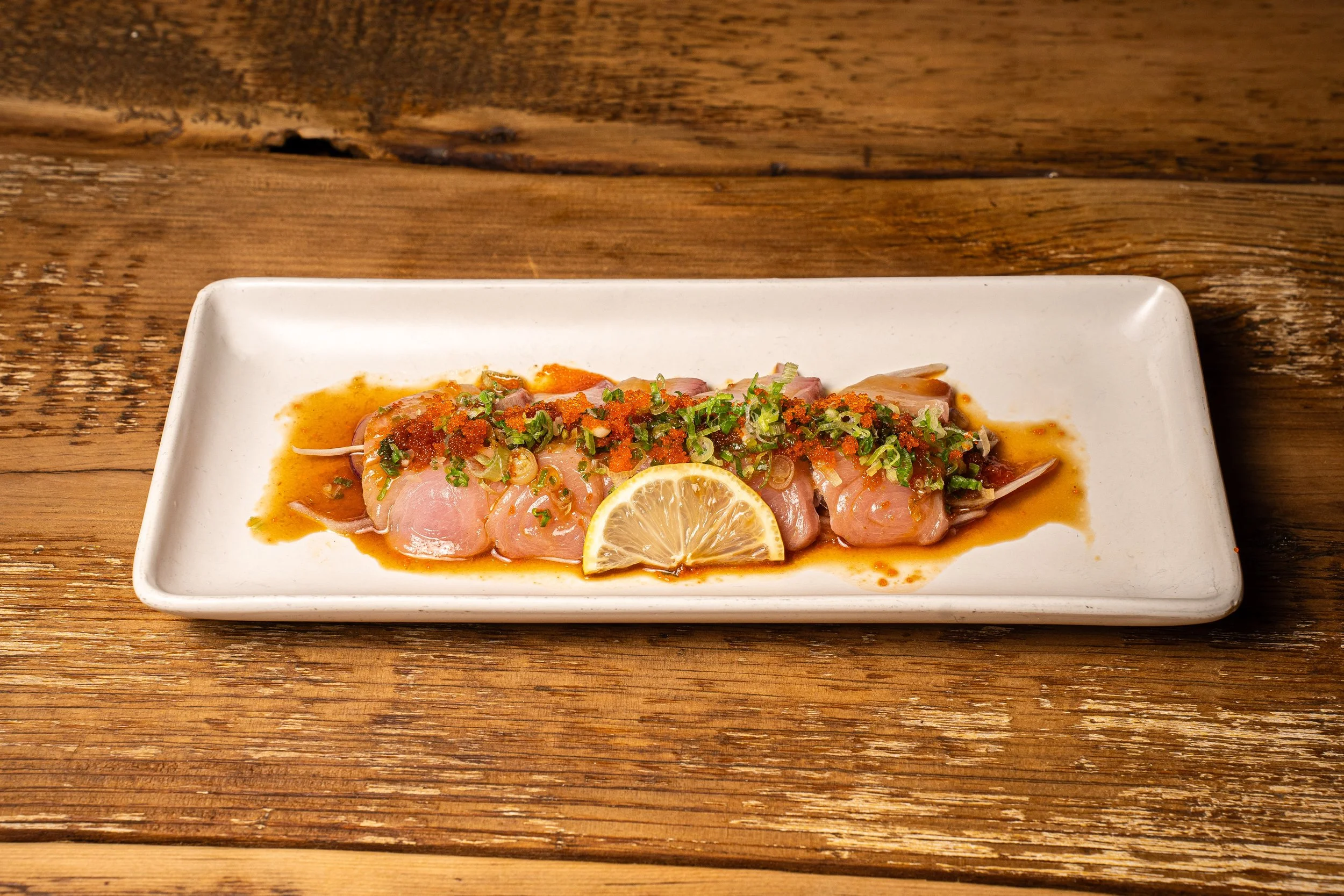 Yellowtail Carpaccio $12