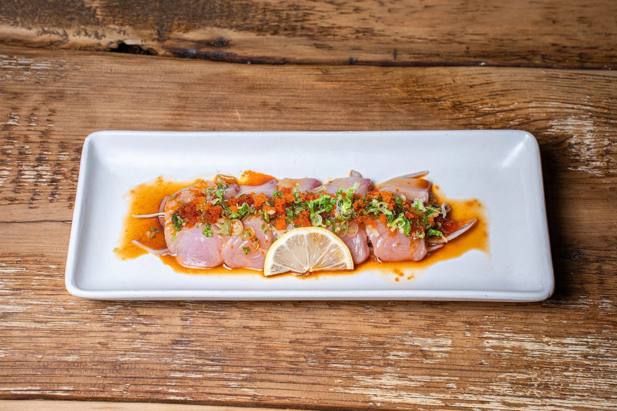 Yellowtail Carpaccio $13.95