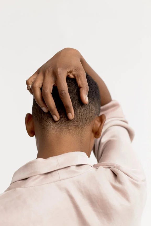 to-be-magnetic-woman-hand-on-head.jpg