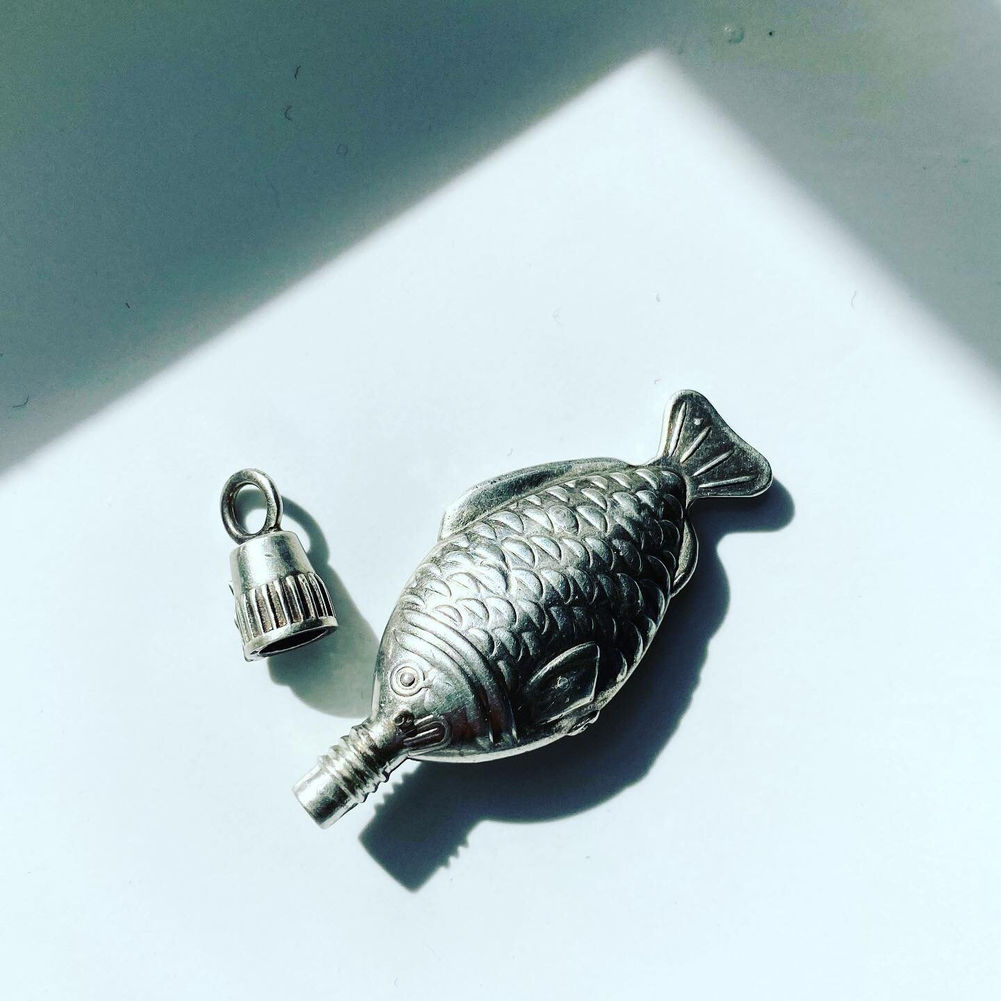 The Iconic soy sauce fish converted into a beautiful wearable perfume pendant, ubiquitous Japanese style in sterling silver by Melbourne Master Jeweller Infinity... check it out on the Accessory Emergency Curated page #japanesestyle #japaneseinfluenc