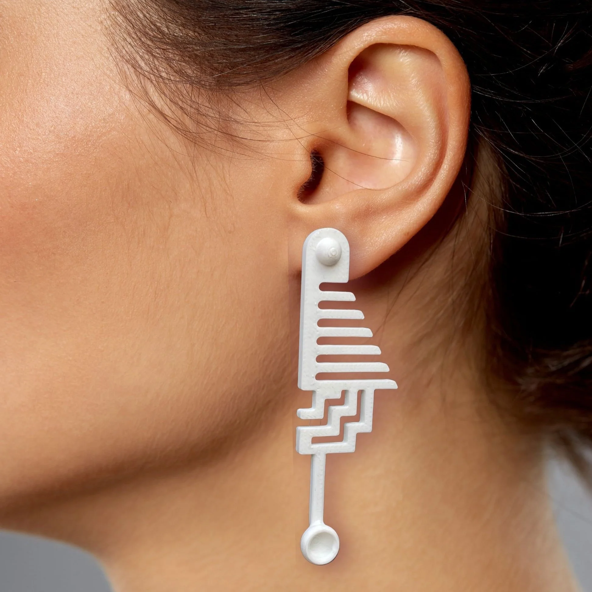 Bold Aztec Drop ear cuff earrings in matte white 3d Printed bio polymer has style cues from art deco and aztec structure.