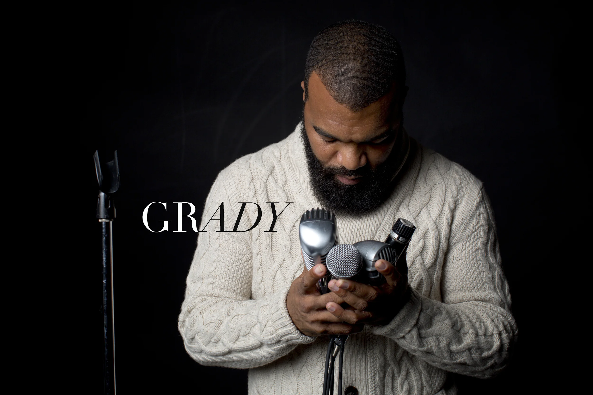 Grady bows to mics.jpg