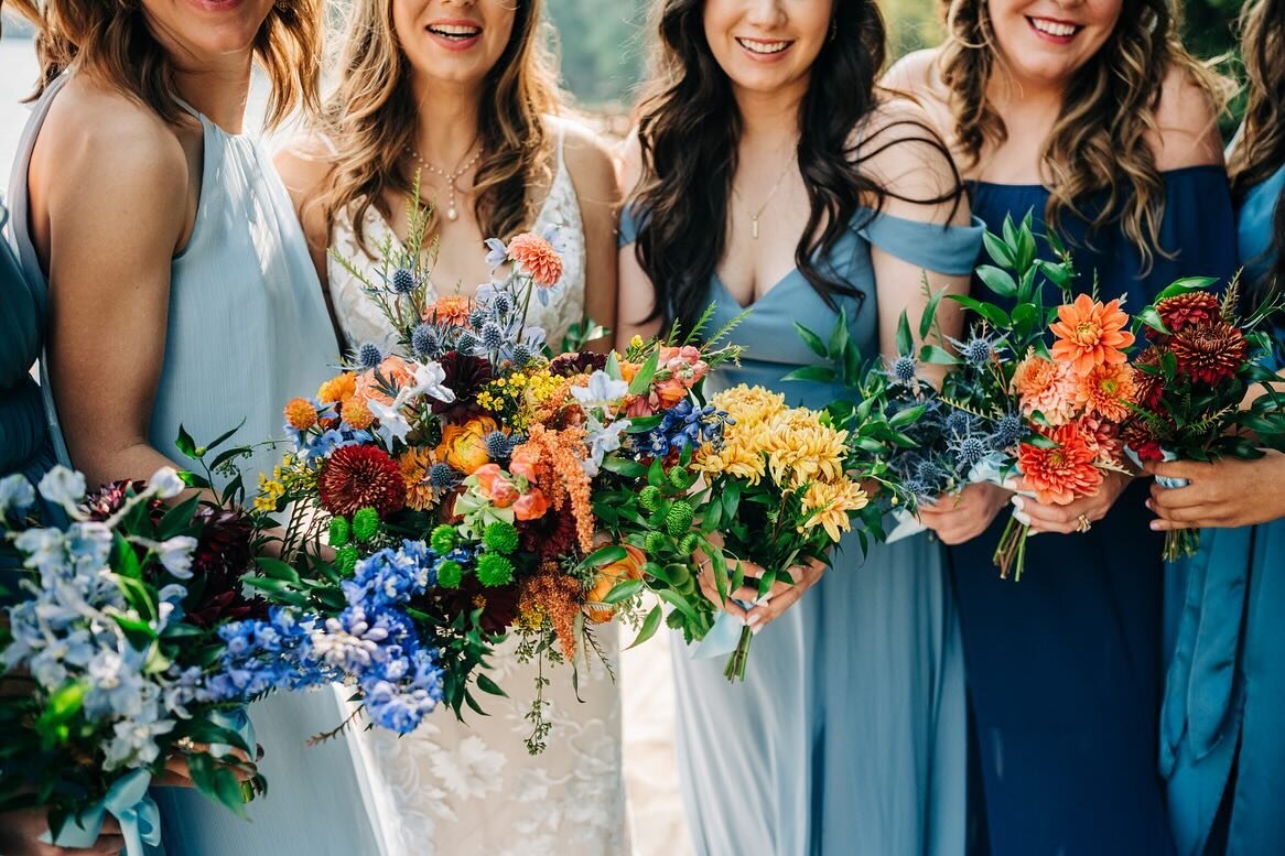 For all my color loving brides! These wildflower bouquets from @daisies.in.may with the different shades of blue dresses were gorgeous for this @elkinsresort wedding! 

Falling in love all over again with old images as I look through the archives to 