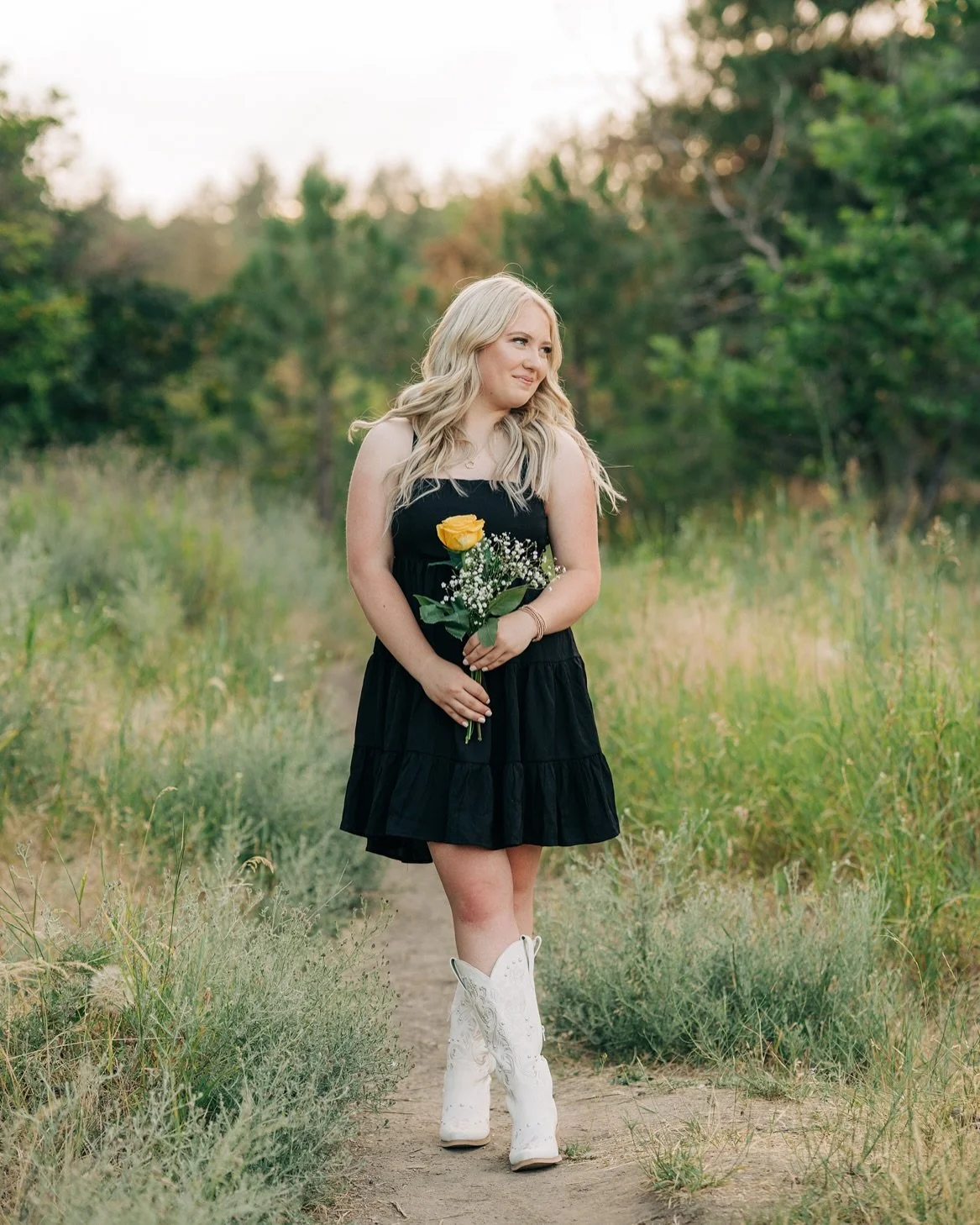 LBD + White Cowboy boots for Miss Allie! Thank you Britt from @calebandbrittphoto for these amazing images, edited by me! #kceseniors #kcenglandphotography #spokanephotographer #spokanesenior #classof2026 #kcesenior