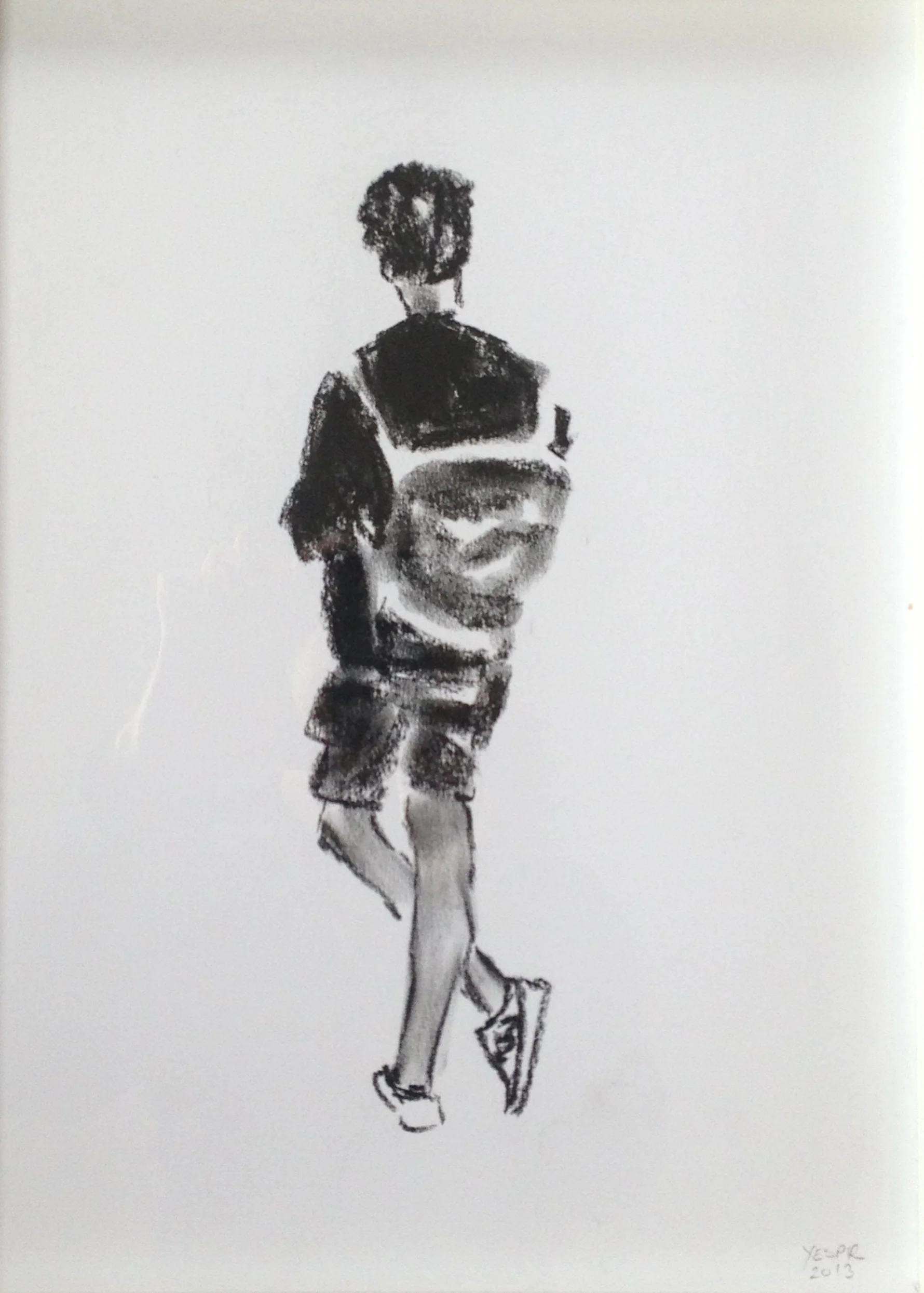 boy standing in street coal drawing
