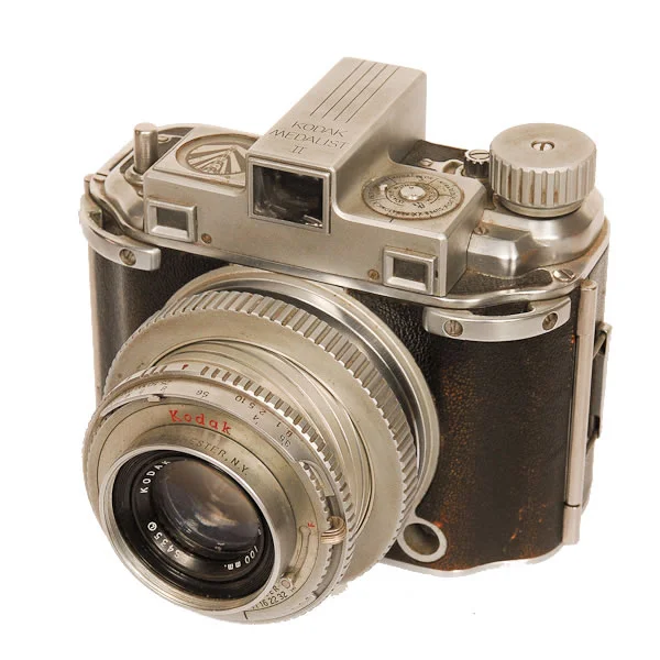 Kodak Medalist 2 1946-1953. A very heavy camera over 2 lbs. The Kodak Medalist II SLR used 620 film. They used a split image range finder.