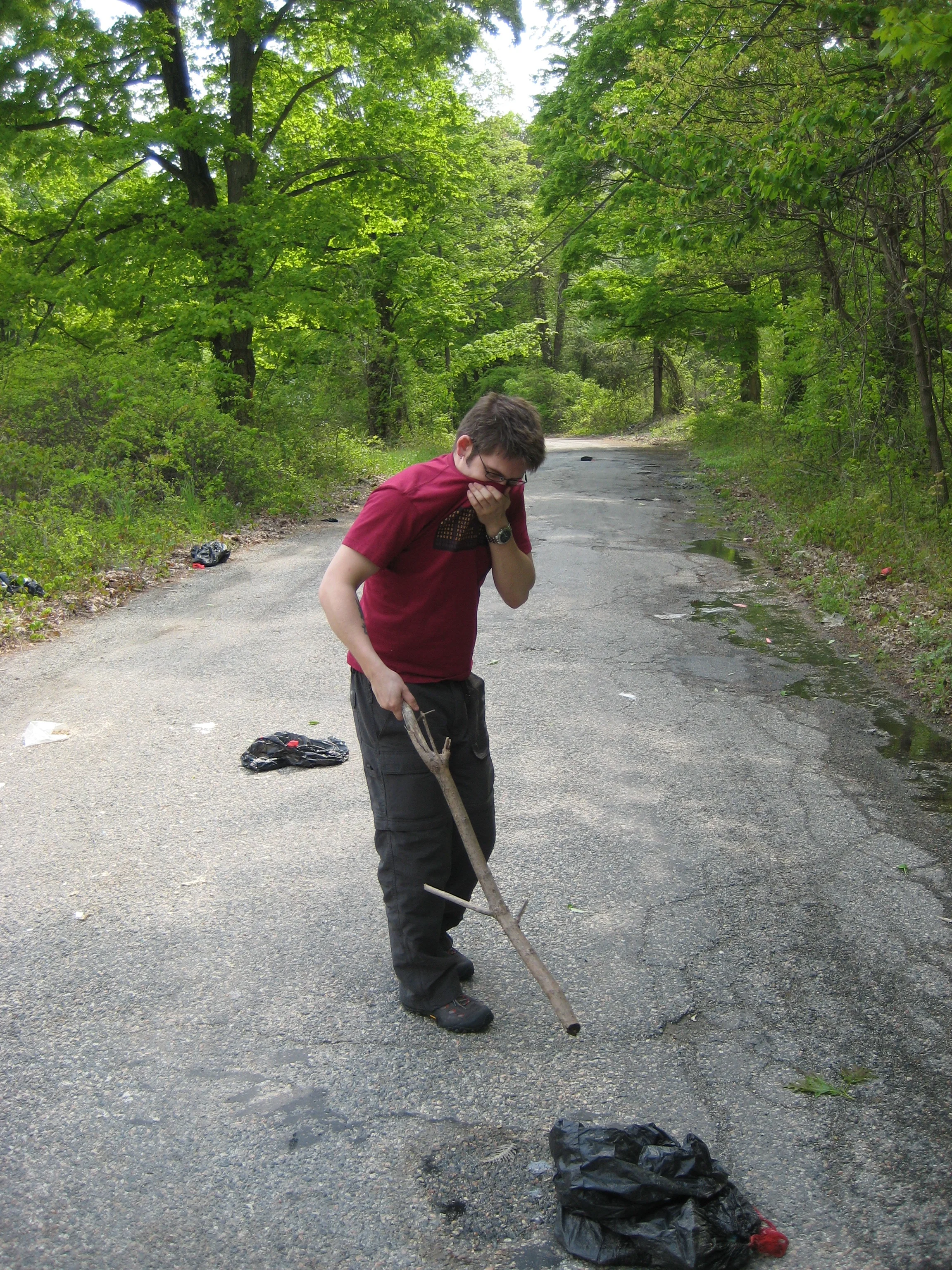 Joe checks out more trash.jpg