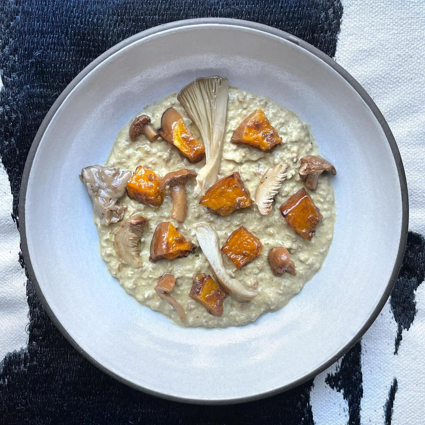 Kasha Risotto | row 7 koginut squash, confit mushrooms, tamarind

Via @krusch92: 
Sliding into fall with this roasty buckwheat groat &ldquo;risotto&rdquo;, featuring a mix of wild mushroom varieties from @pauljamesbutler's forager friend Bill, and (f