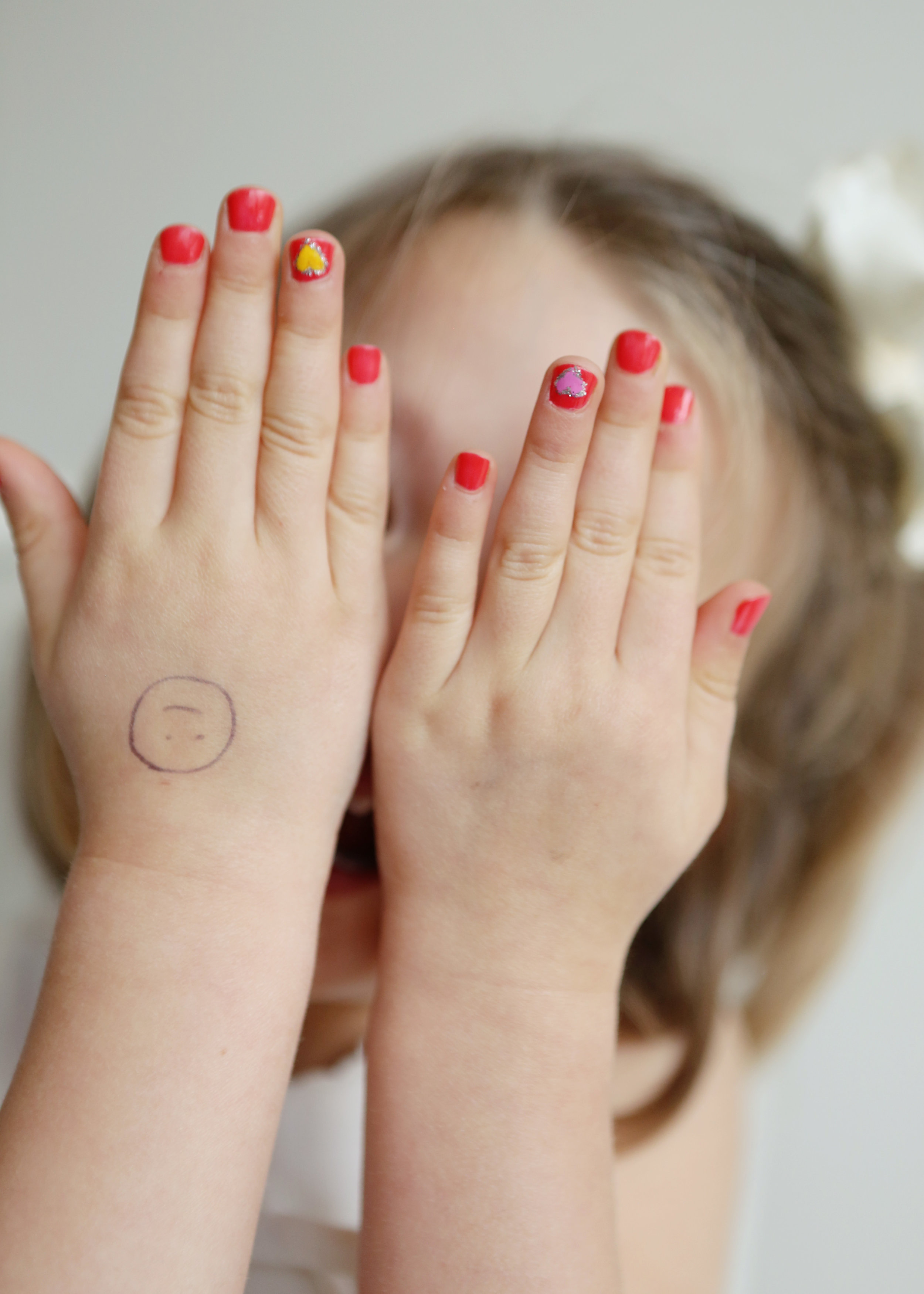 NJ and NYC based lifestyle photographer | Jennifer Lavelle Photography |  children and families, newborn, lifestyle, interiors, food and travel.  Little girl's painted nails.