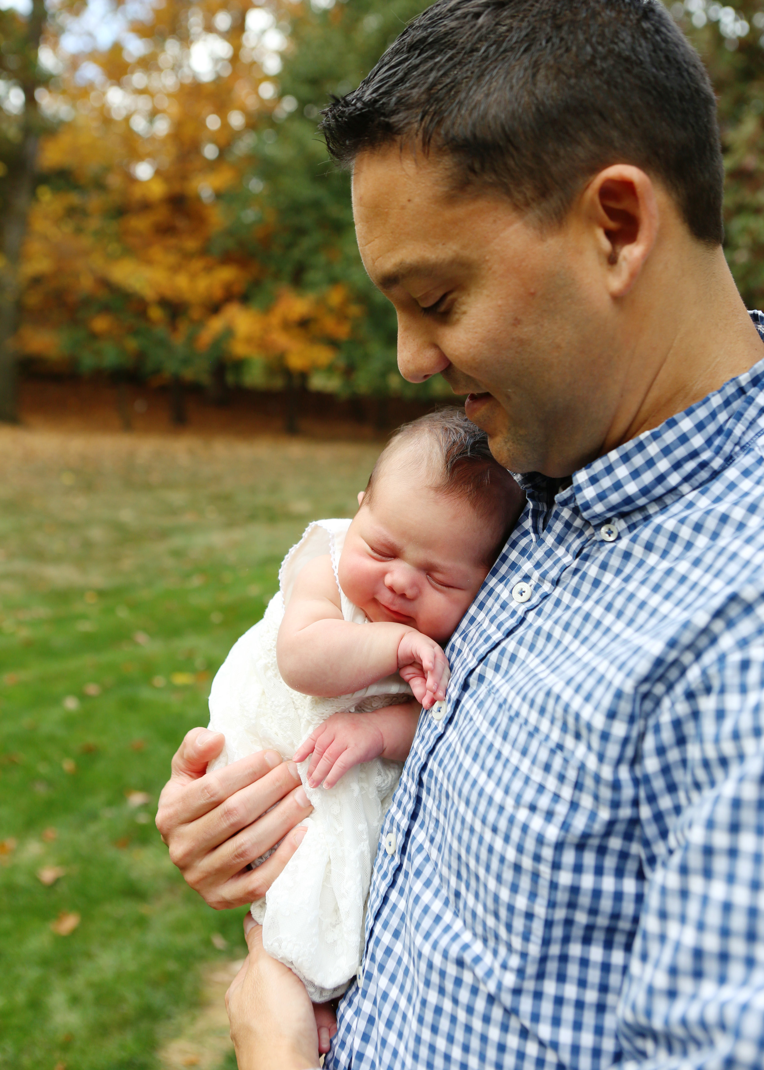 NJ and NYC based lifestyle photographer | Jennifer Lavelle Photography |  children and families, newborn, lifestyle, interiors, food and travel.  Newborn session with Dad holding Baby.