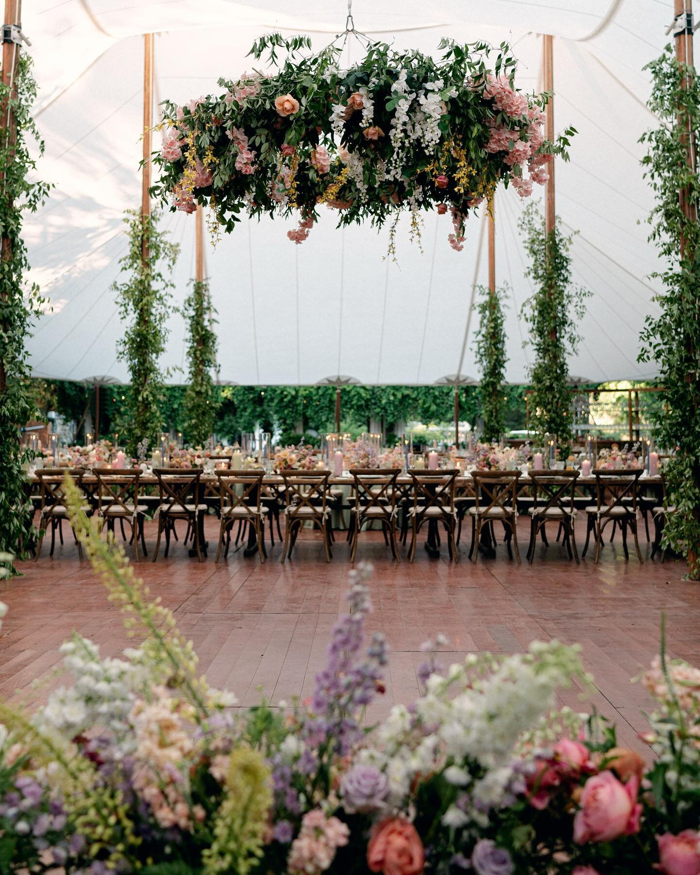 Big statements. I like to create surprise moments for clients- like this chandelier where we added loads of blooms to what was supposed to be a mostly green design. 🪄 Photo @abbyjiu Planning @gritandgraceinc Venue @thecliftonva