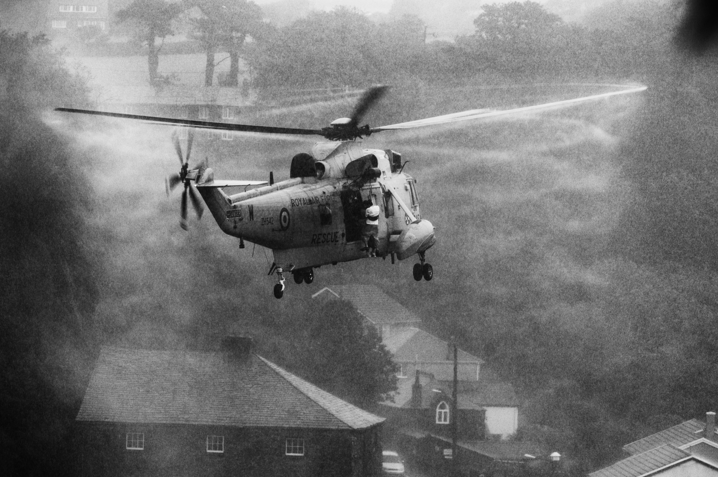   RAF Search and Rescue helicopters rescue flood victims in Boscastle, Cornwall, August 16, 2004. (Photo/Mark Pearson)  