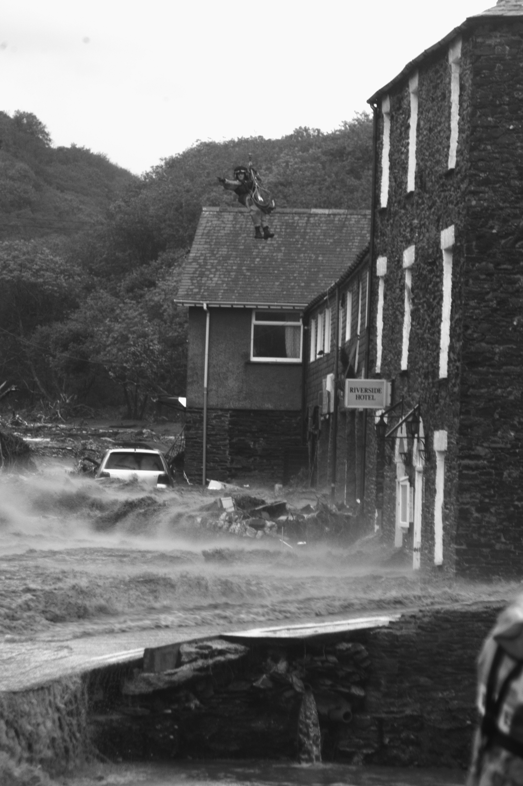   RAF search teams look for flood victims in Boscastle, Cornwall, August 16, 2004. (Photo/Mark Pearson)  