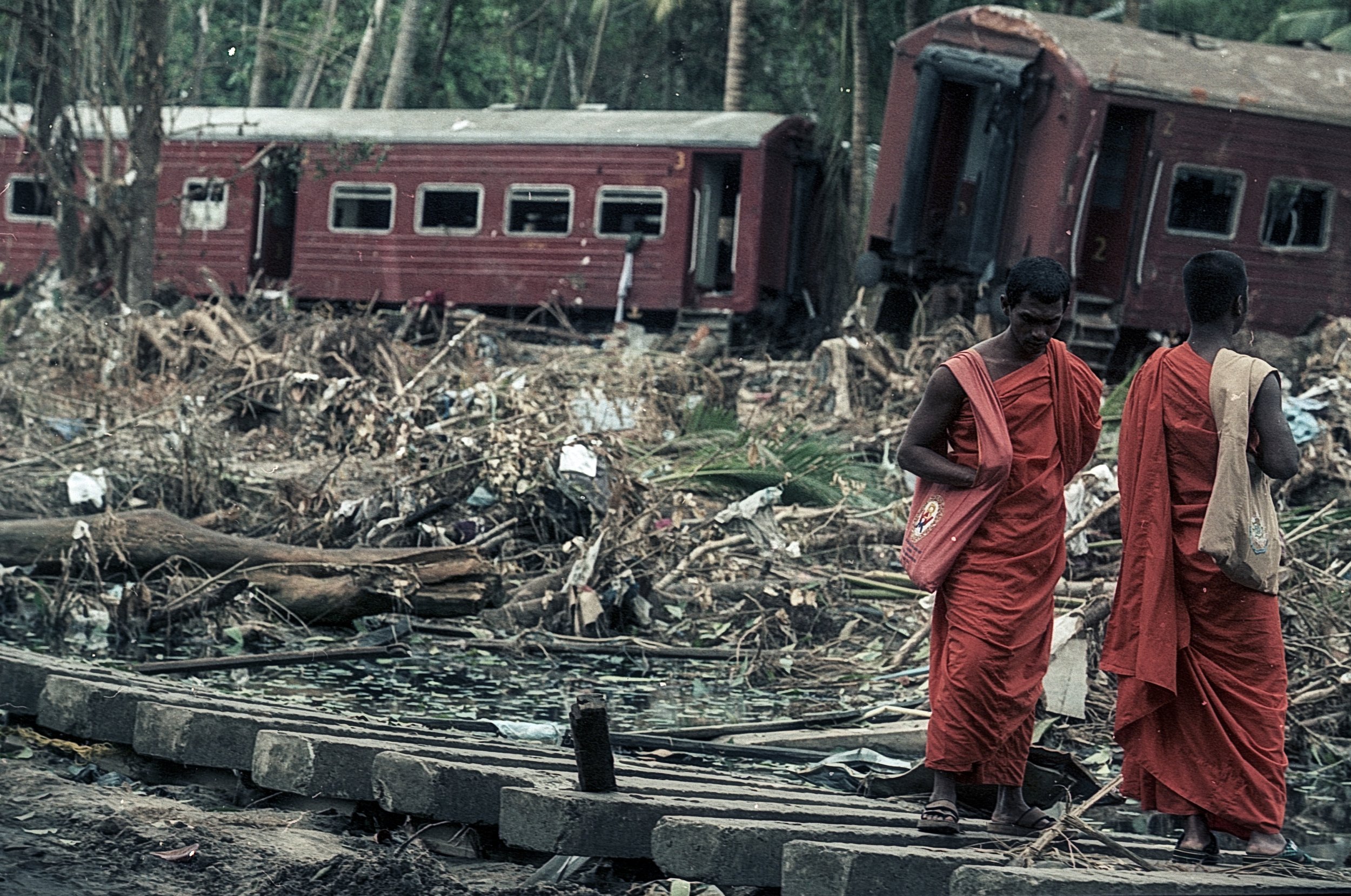 On Dec 26, 2004, a tsunami hit Sri Lanka, derailing the "Queen of the Sea" train, killing 1,700-2,500 passengers, and leaving only about 150 survivors. Telwatta, Sri Lanka, December 31, 2004 © Mark Pearson