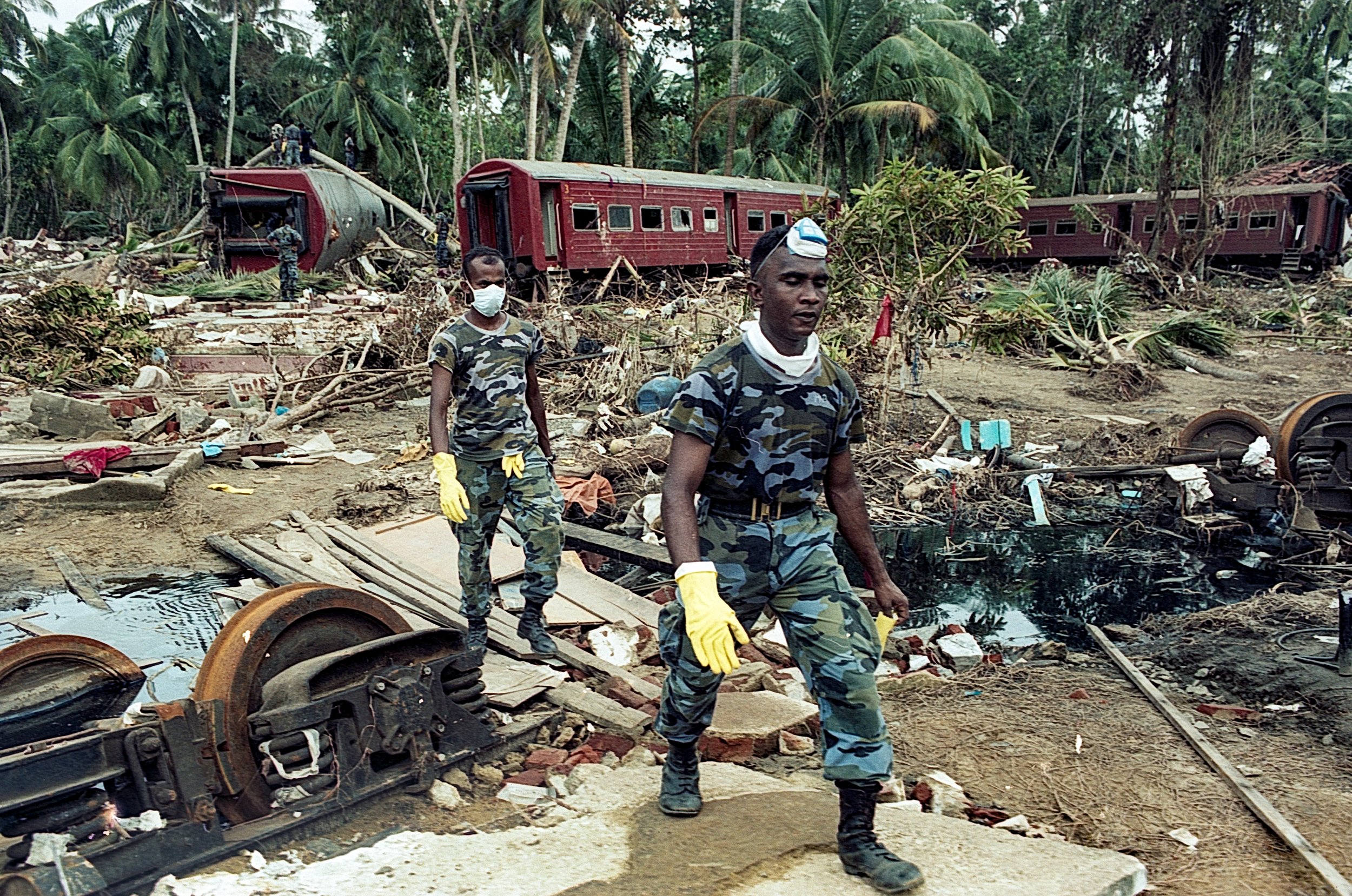 On Dec 26, 2004, a tsunami hit Sri Lanka, derailing the "Queen of the Sea" train, killing 1,700-2,500 passengers, and leaving only about 150 survivors. Telwatta, Sri Lanka, December 31, 2004 © Mark Pearson