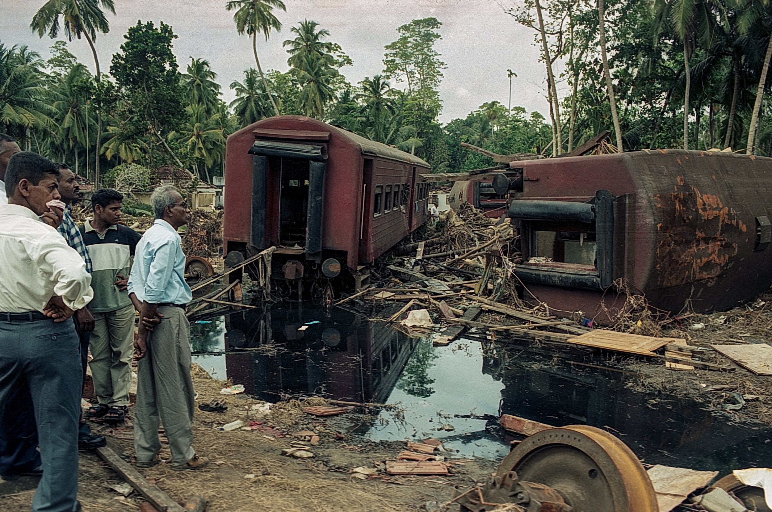 On Dec 26, 2004, a tsunami hit Sri Lanka, derailing the "Queen of the Sea" train, killing 1,700-2,500 passengers, and leaving only about 150 survivors. Telwatta, Sri Lanka, December 31, 2004 © Mark Pearson