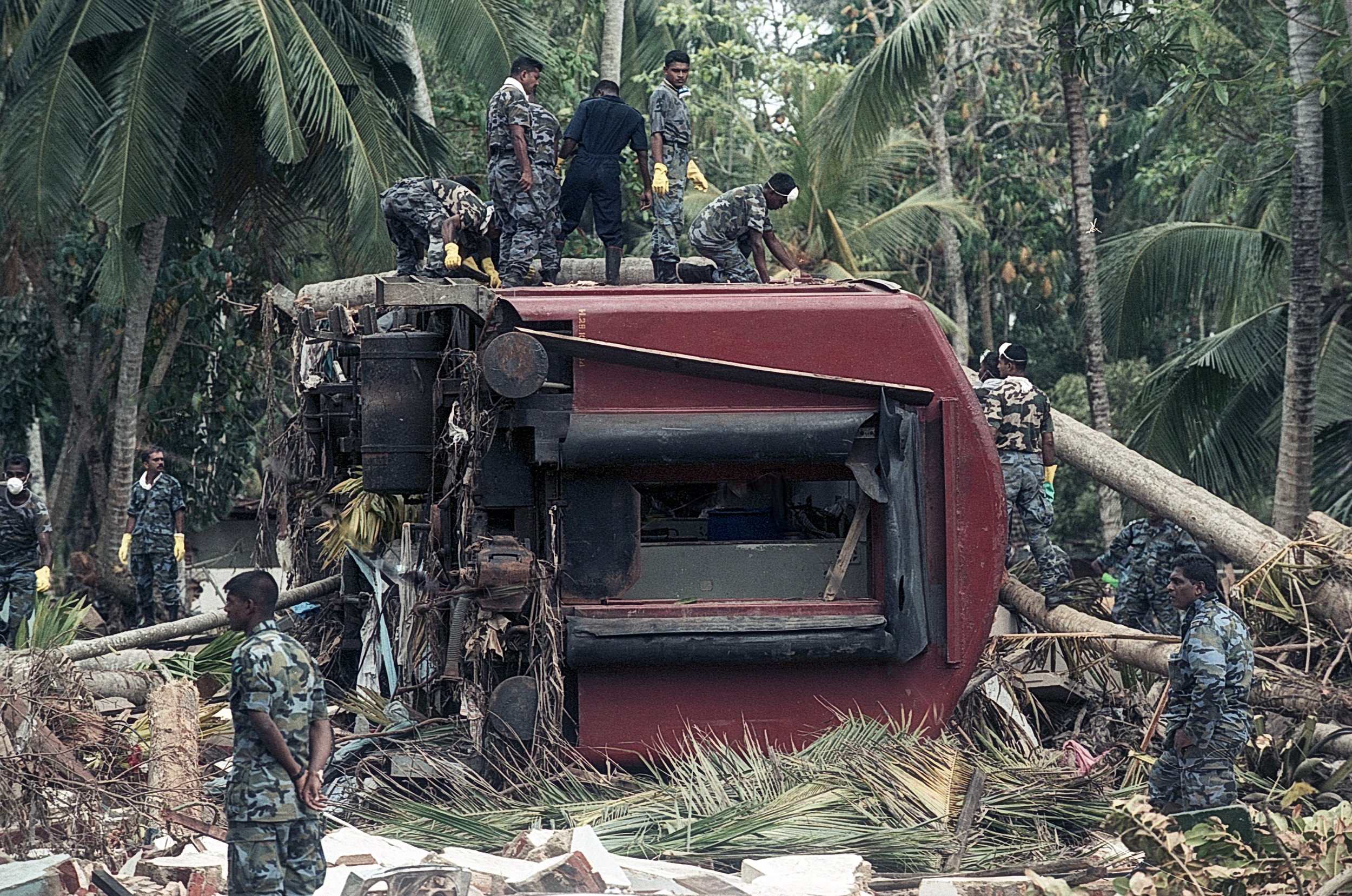 On Dec 26, 2004, a tsunami hit Sri Lanka, derailing the "Queen of the Sea" train, killing 1,700-2,500 passengers, and leaving only about 150 survivors. Telwatta, Sri Lanka, December 31, 2004 © Mark Pearson