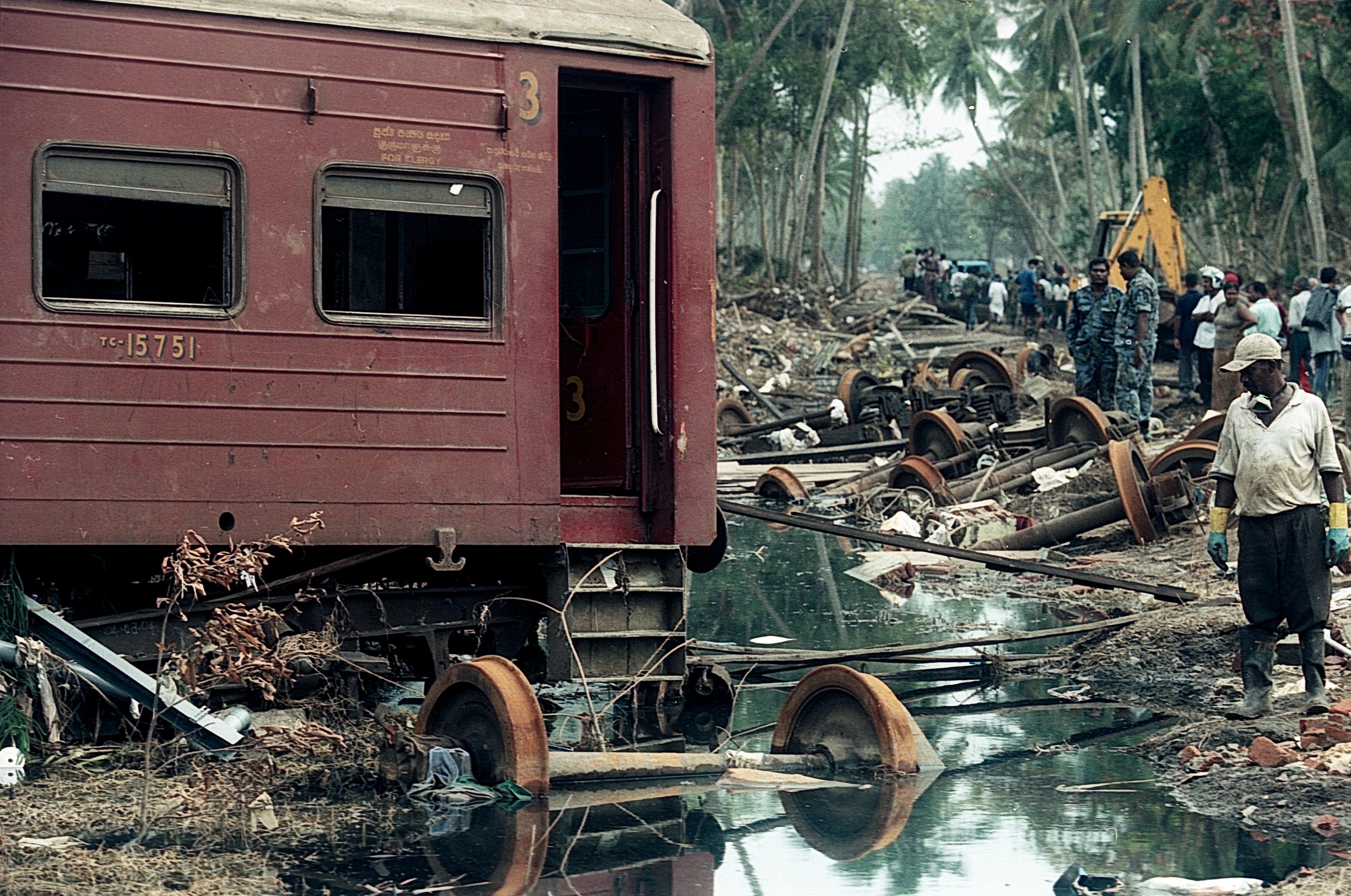 On Dec 26, 2004, a tsunami hit Sri Lanka, derailing the "Queen of the Sea" train, killing 1,700-2,500 passengers, and leaving only about 150 survivors. Telwatta, Sri Lanka, December 31, 2004 © Mark Pearson