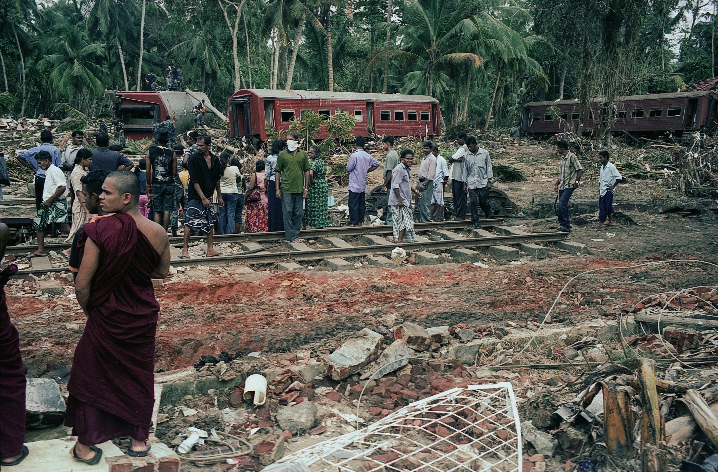 On Dec 26, 2004, a tsunami hit Sri Lanka, derailing the "Queen of the Sea" train, killing 1,700-2,500 passengers, and leaving only about 150 survivors. Telwatta, Sri Lanka, December 31, 2004 © Mark Pearson