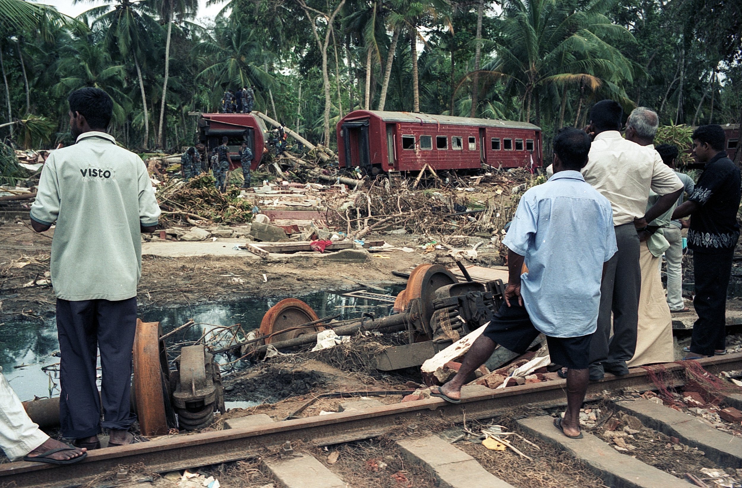 On Dec 26, 2004, a tsunami hit Sri Lanka, derailing the "Queen of the Sea" train, killing 1,700-2,500 passengers, and leaving only about 150 survivors. Telwatta, Sri Lanka, December 31, 2004 © Mark Pearson
