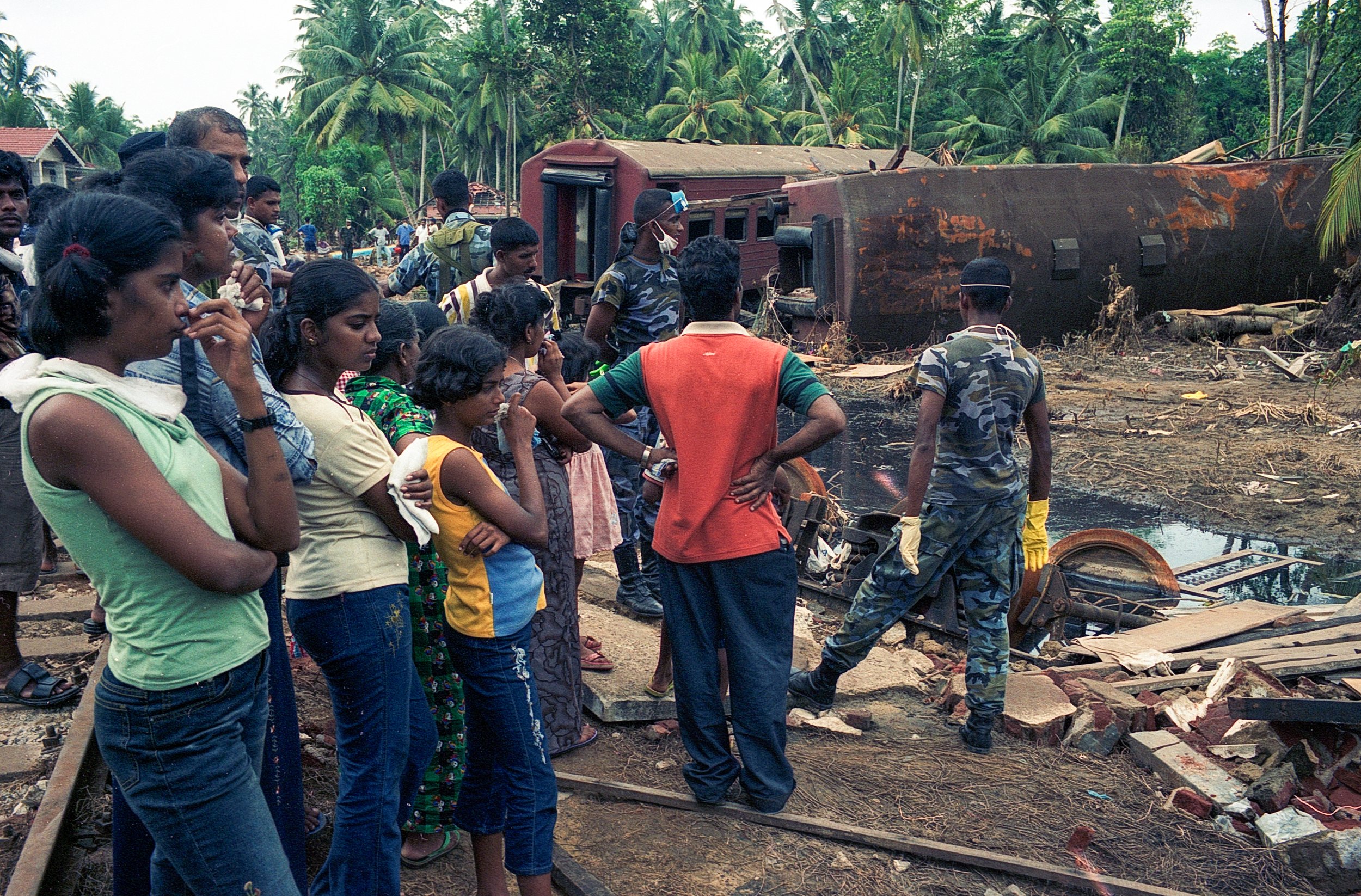 On Dec 26, 2004, a tsunami hit Sri Lanka, derailing the "Queen of the Sea" train, killing 1,700-2,500 passengers, and leaving only about 150 survivors. Telwatta, Sri Lanka, December 31, 2004 © Mark Pearson