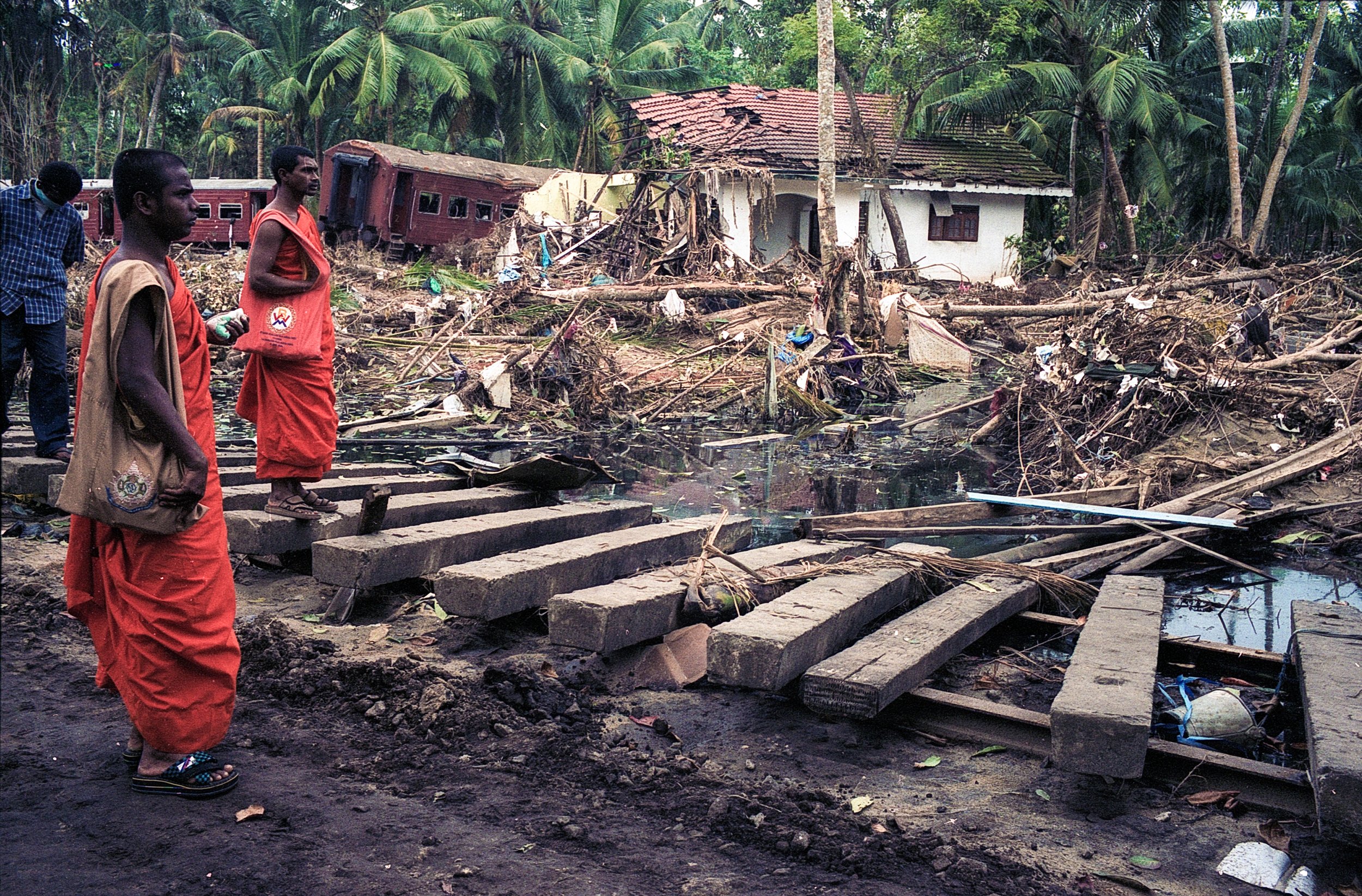 On Dec 26, 2004, a tsunami hit Sri Lanka, derailing the "Queen of the Sea" train, killing 1,700-2,500 passengers, and leaving only about 150 survivors. Telwatta, Sri Lanka, December 31, 2004 © Mark Pearson