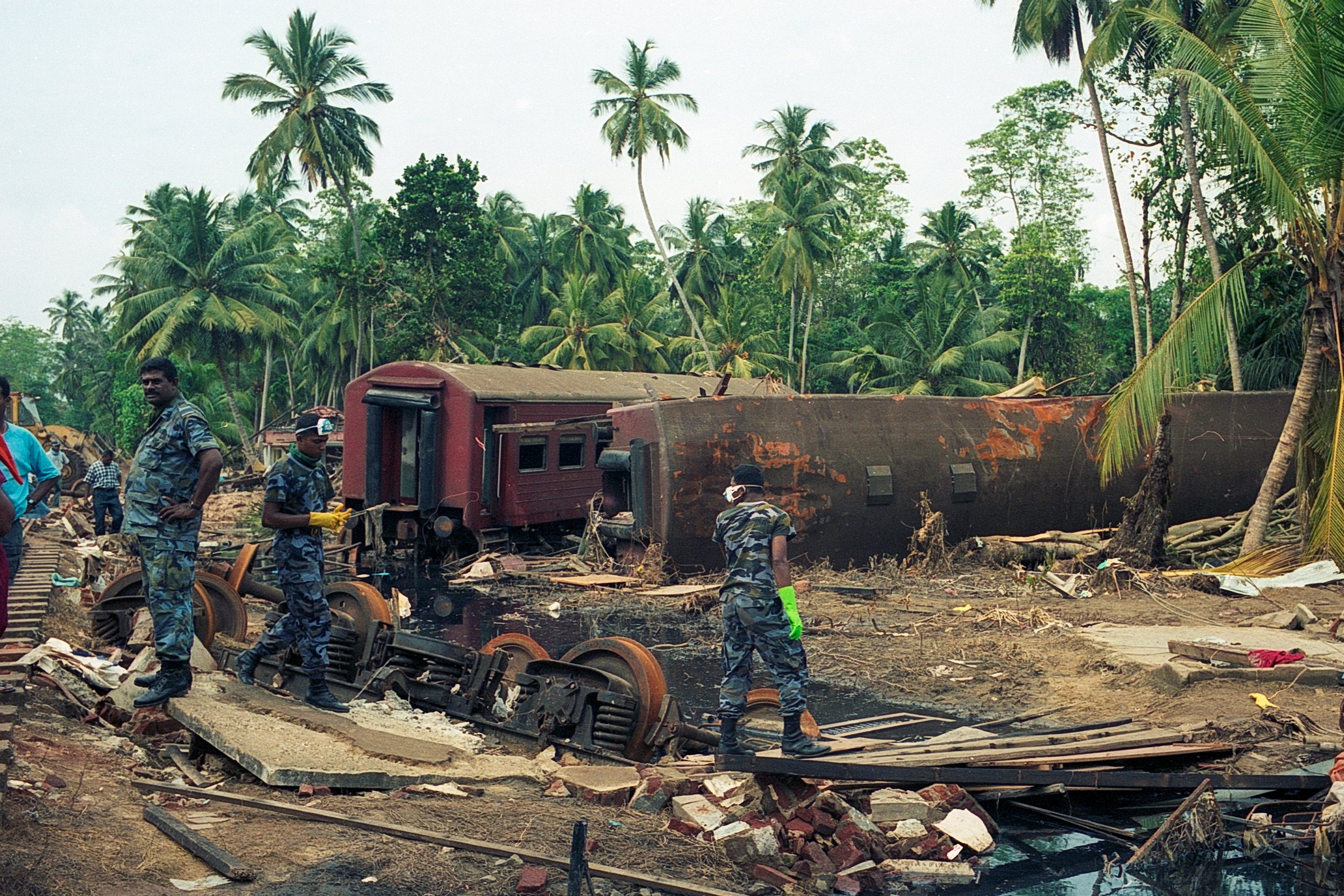 On Dec 26, 2004, a tsunami hit Sri Lanka, derailing the "Queen of the Sea" train, killing 1,700-2,500 passengers, and leaving only about 150 survivors. Telwatta, Sri Lanka, December 31, 2004 © Mark Pearson
