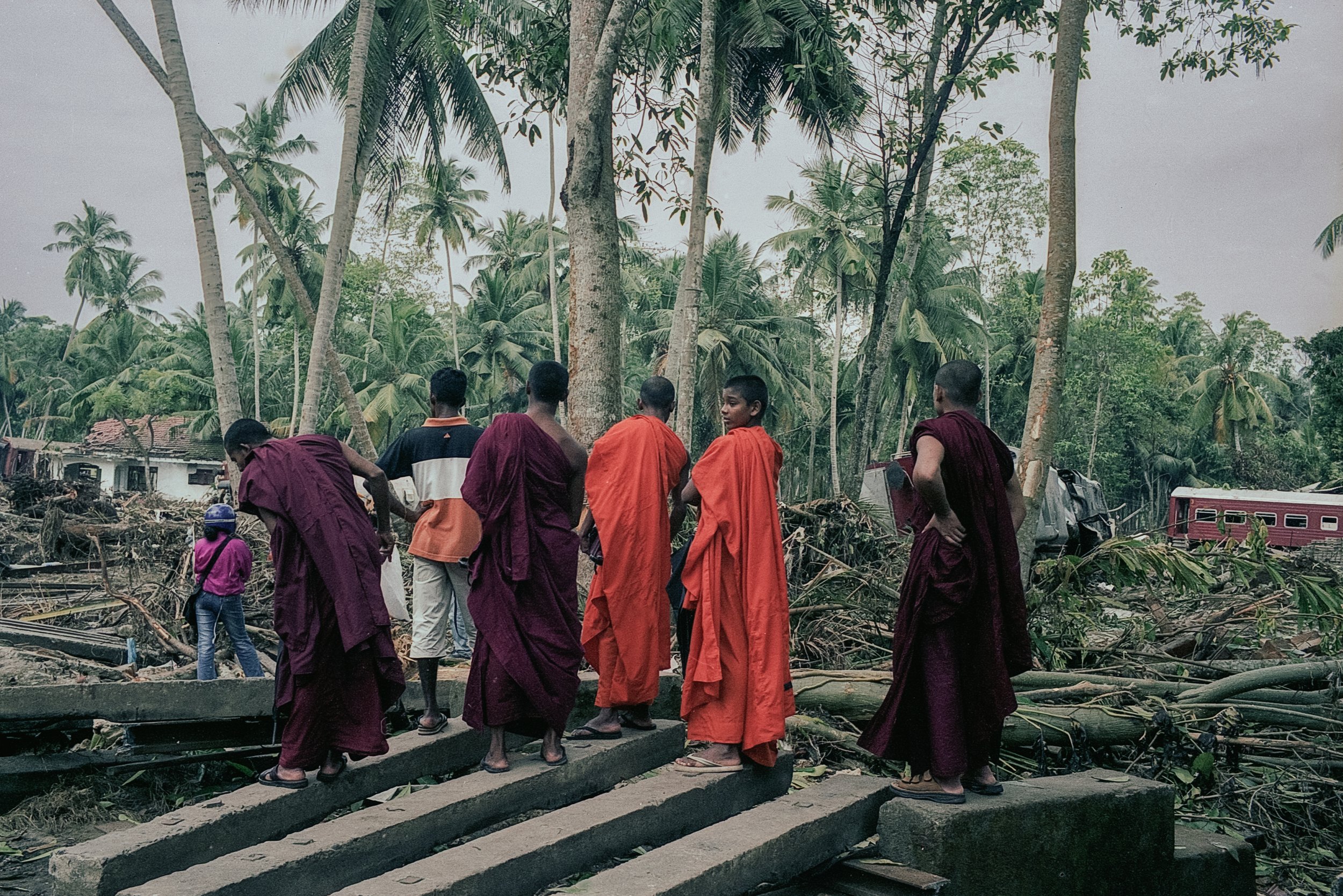 On Dec 26, 2004, a tsunami hit Sri Lanka, derailing the "Queen of the Sea" train, killing 1,700-2,500 passengers, and leaving only about 150 survivors. Telwatta, Sri Lanka, December 31, 2004 © Mark Pearson
