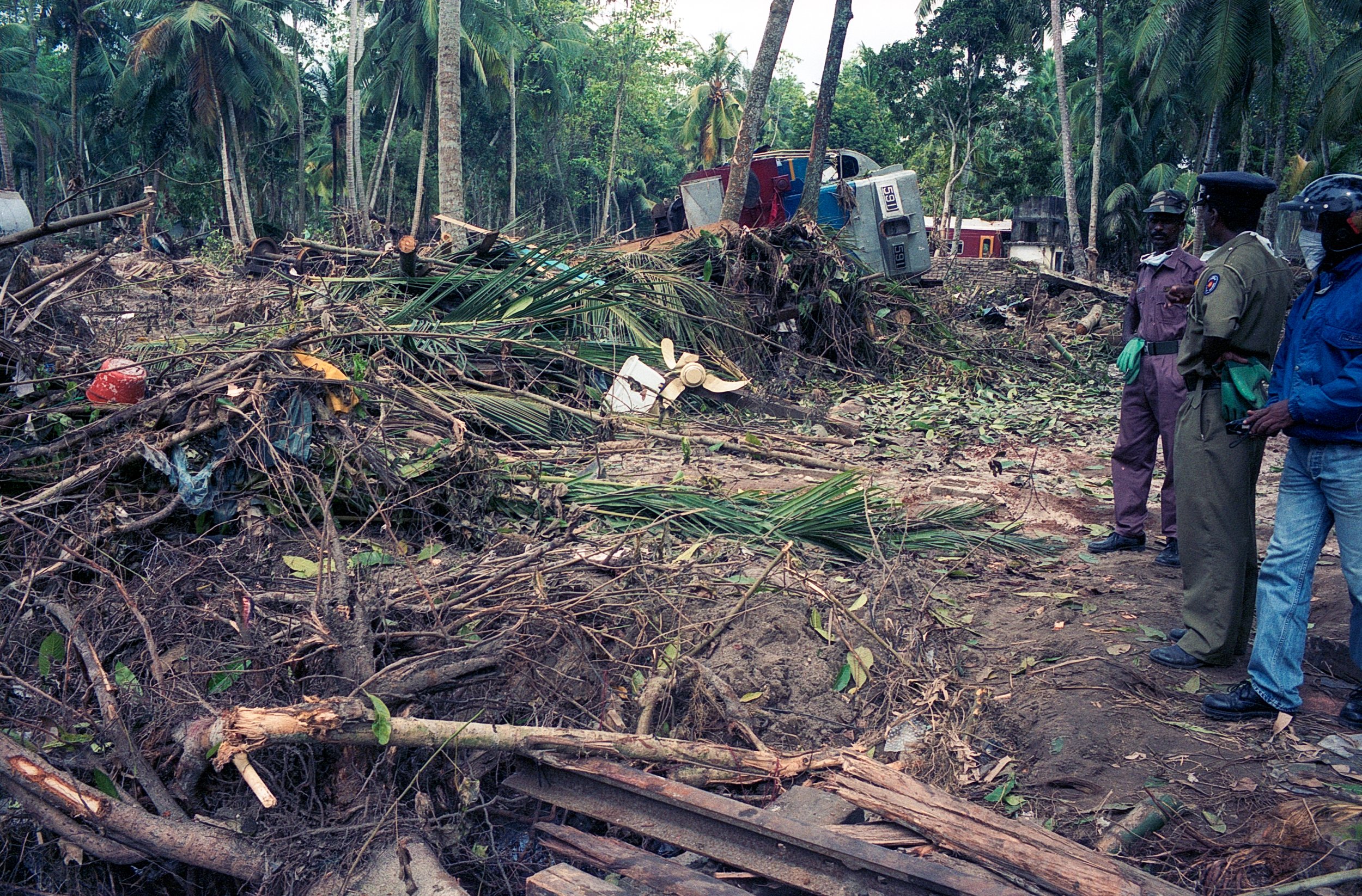 On Dec 26, 2004, a tsunami hit Sri Lanka, derailing the "Queen of the Sea" train, killing 1,700-2,500 passengers, and leaving only about 150 survivors. Telwatta, Sri Lanka, December 31, 2004 © Mark Pearson