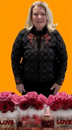 2025-2-4-KAREN_MARSHALL_W_HER_FLOWER_ARRANGMENT (1).jpg