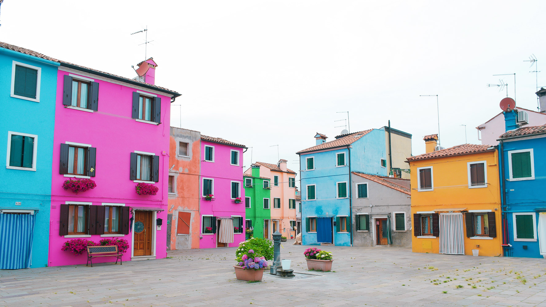 A piazza in Burano, Italy, the most colorful town in Europe